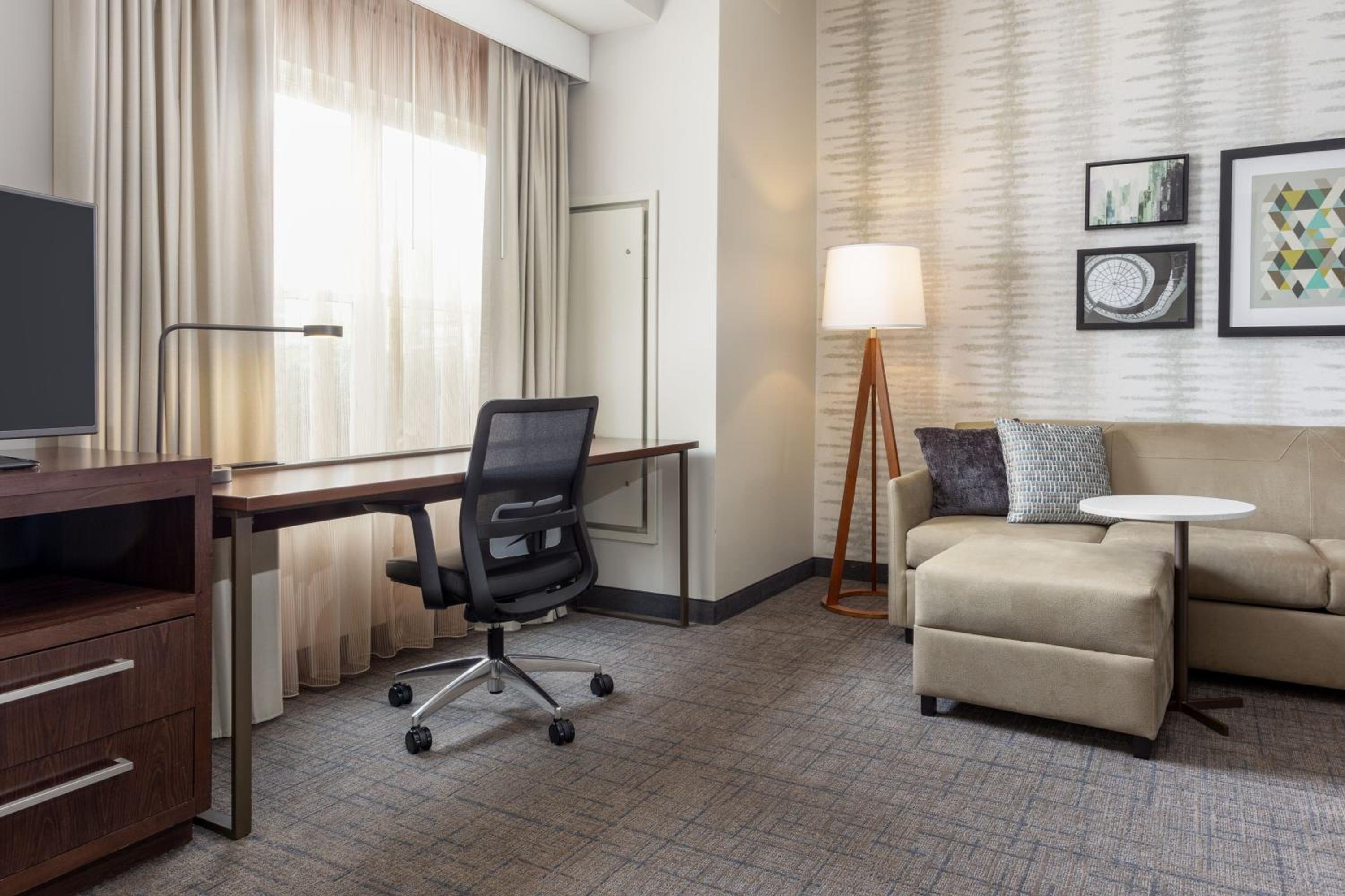 One-Bedroom King Suite with Roll-In Shower and Sofa Bed photo 2