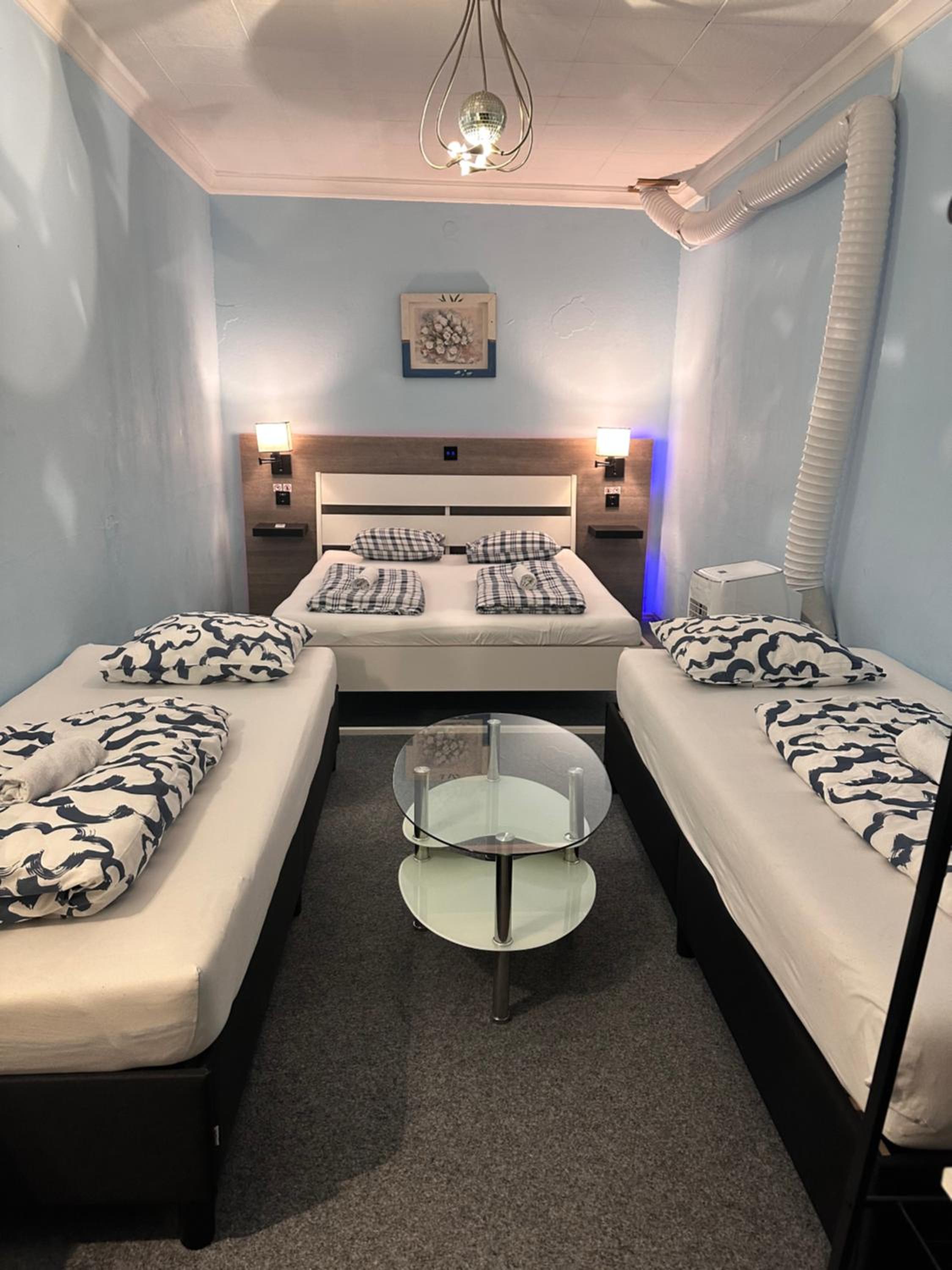 Economy Quadruple Room with Shared Bathroom
