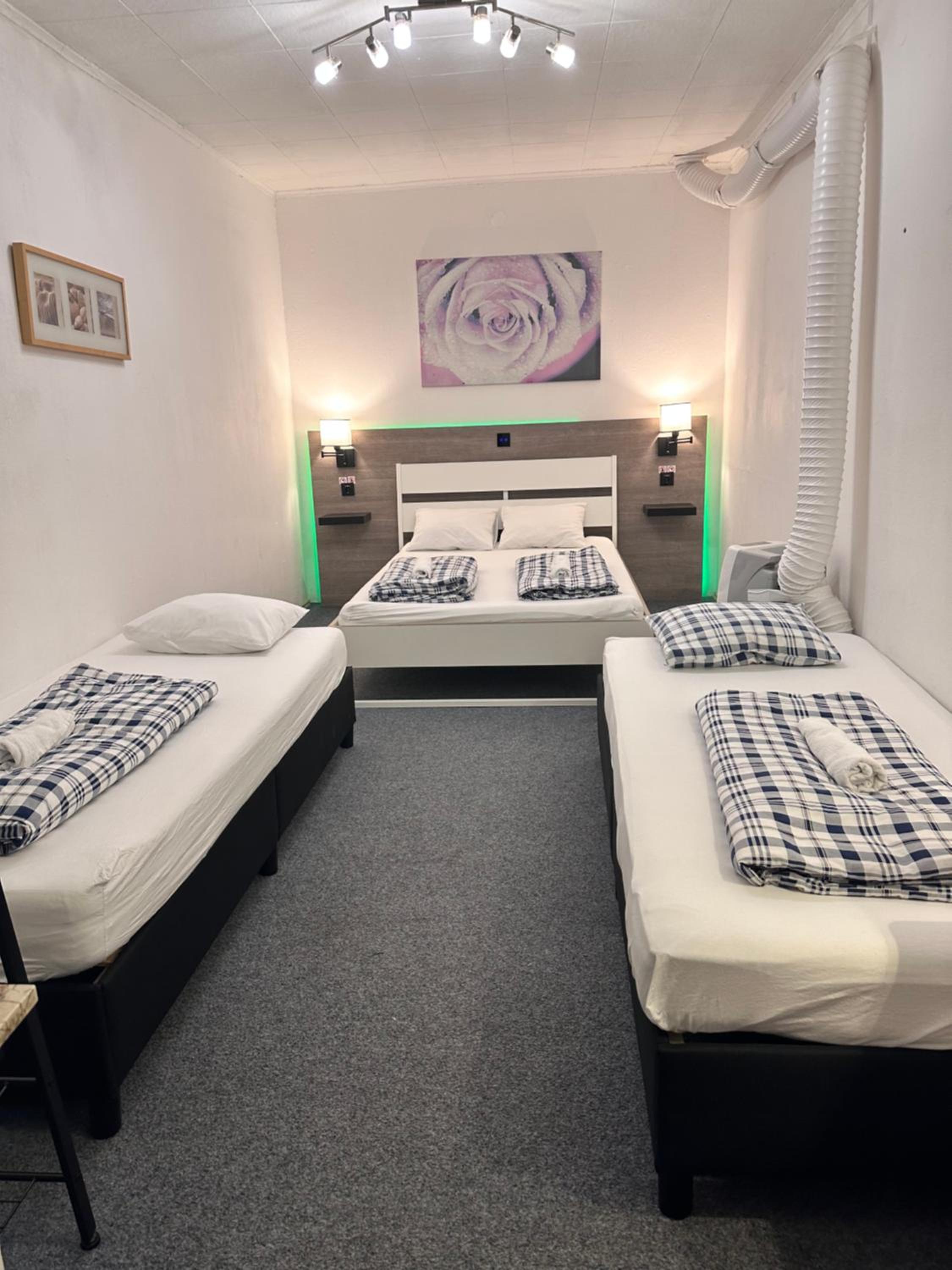 Economy Quadruple Room with Shared Bathroom