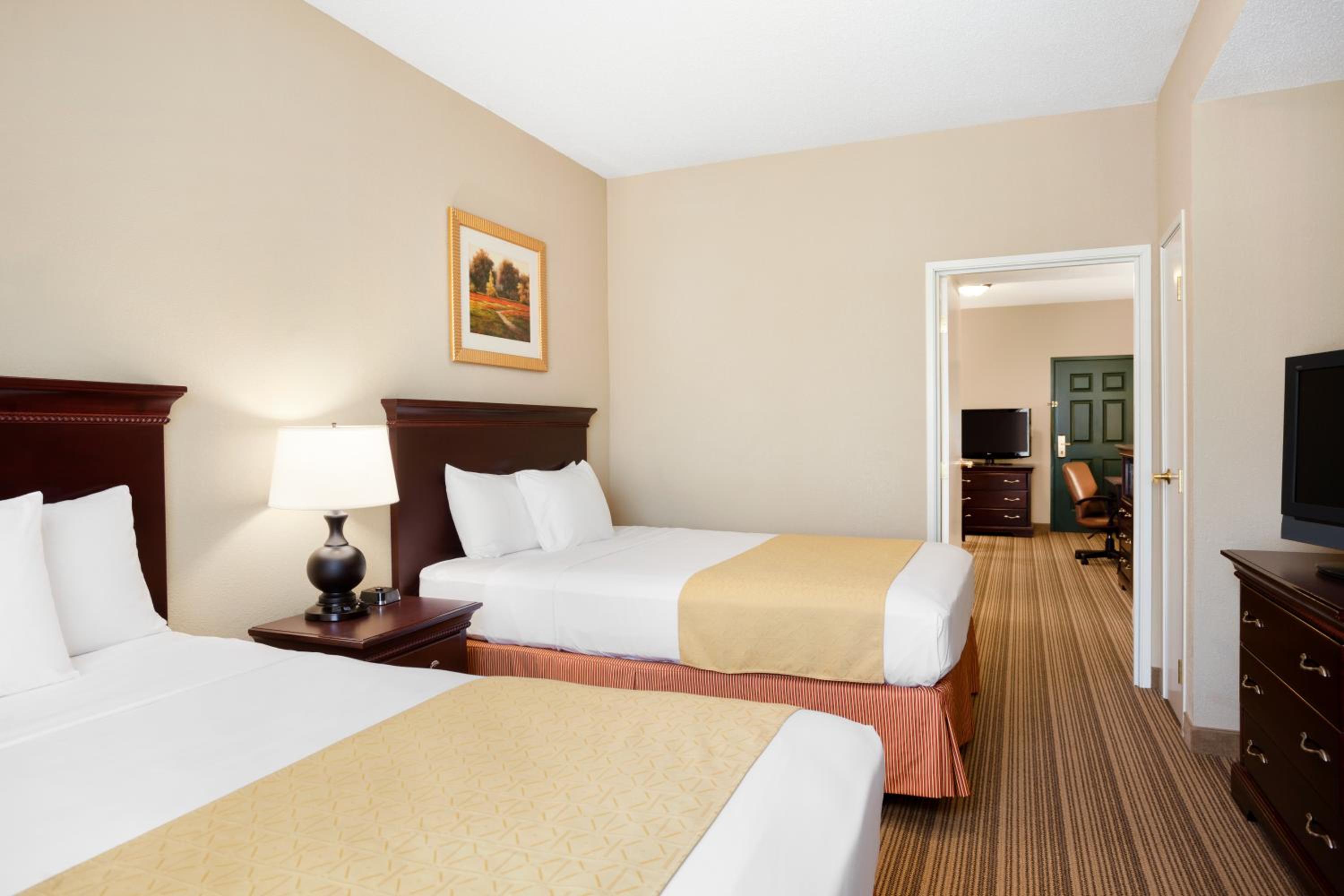 Queen Suite with Two Queen Beds and Kitchen - Non-Smoking - Photo 1