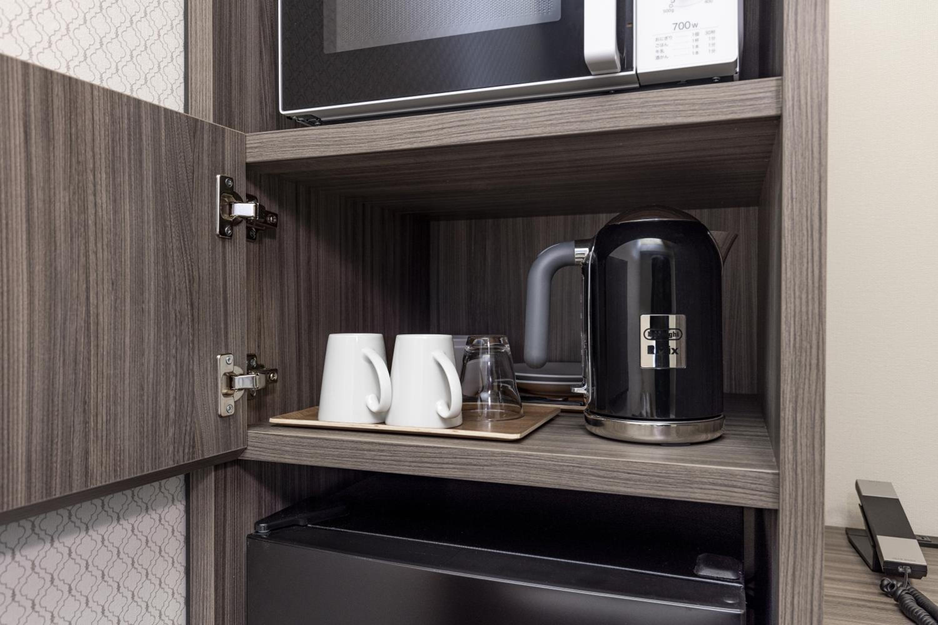 Moderate Double Room with 55 in Bed and In-room Washer-Dryer 1-2Adult