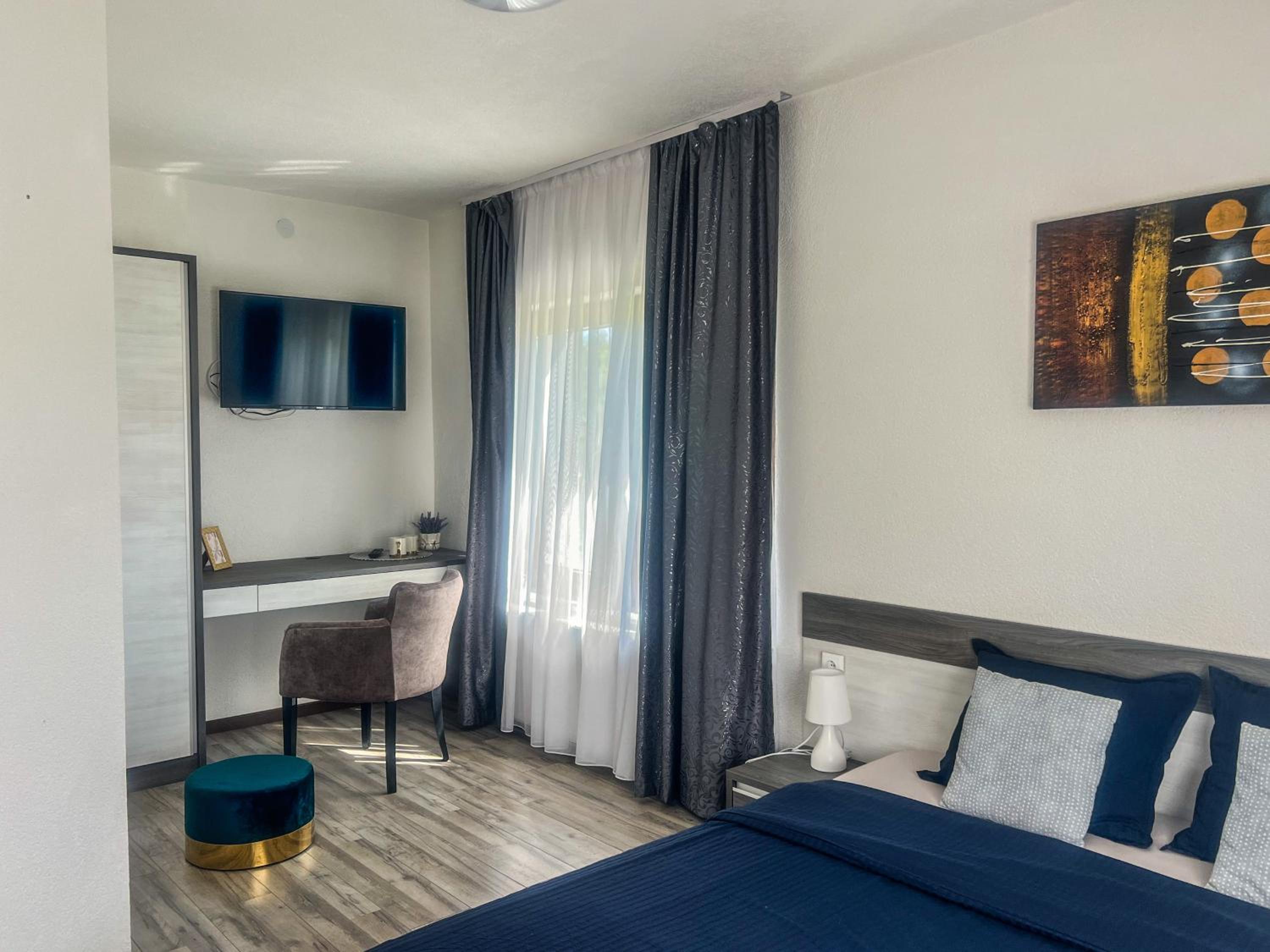 Deluxe Room - Photo 1