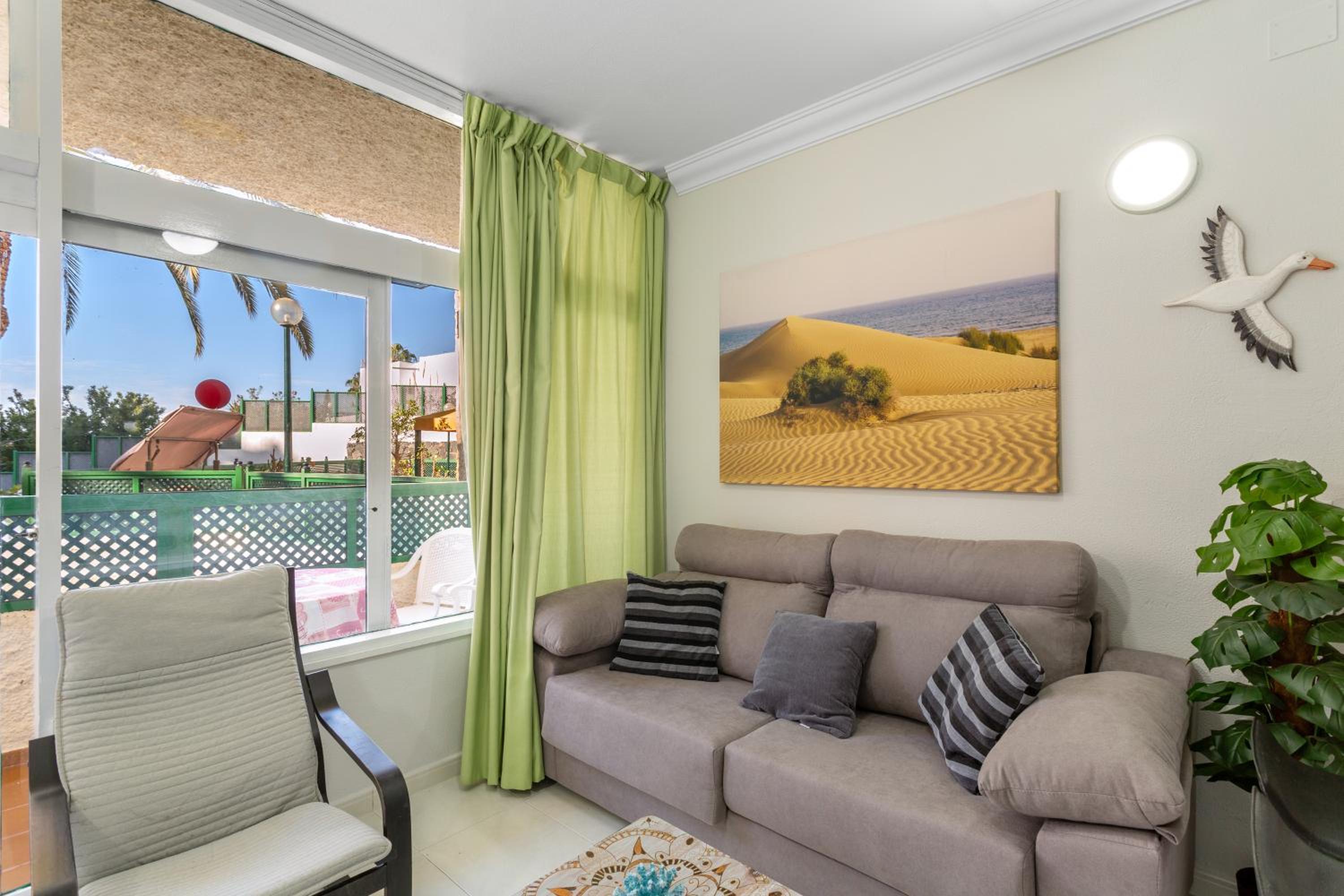 Apartamento de un dormitorio superior con balcón