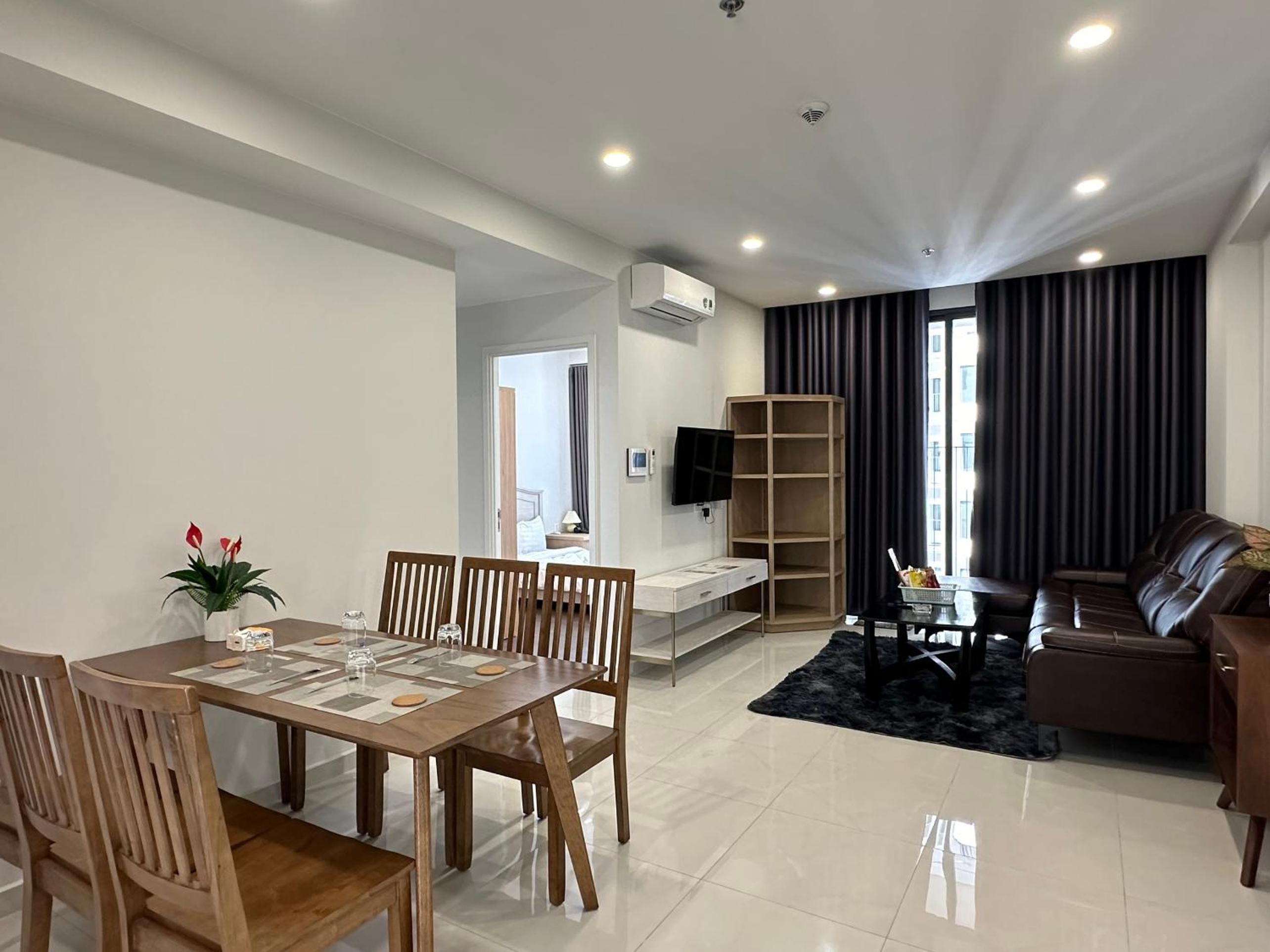 Three-Bedroom Apartment - Photo 12