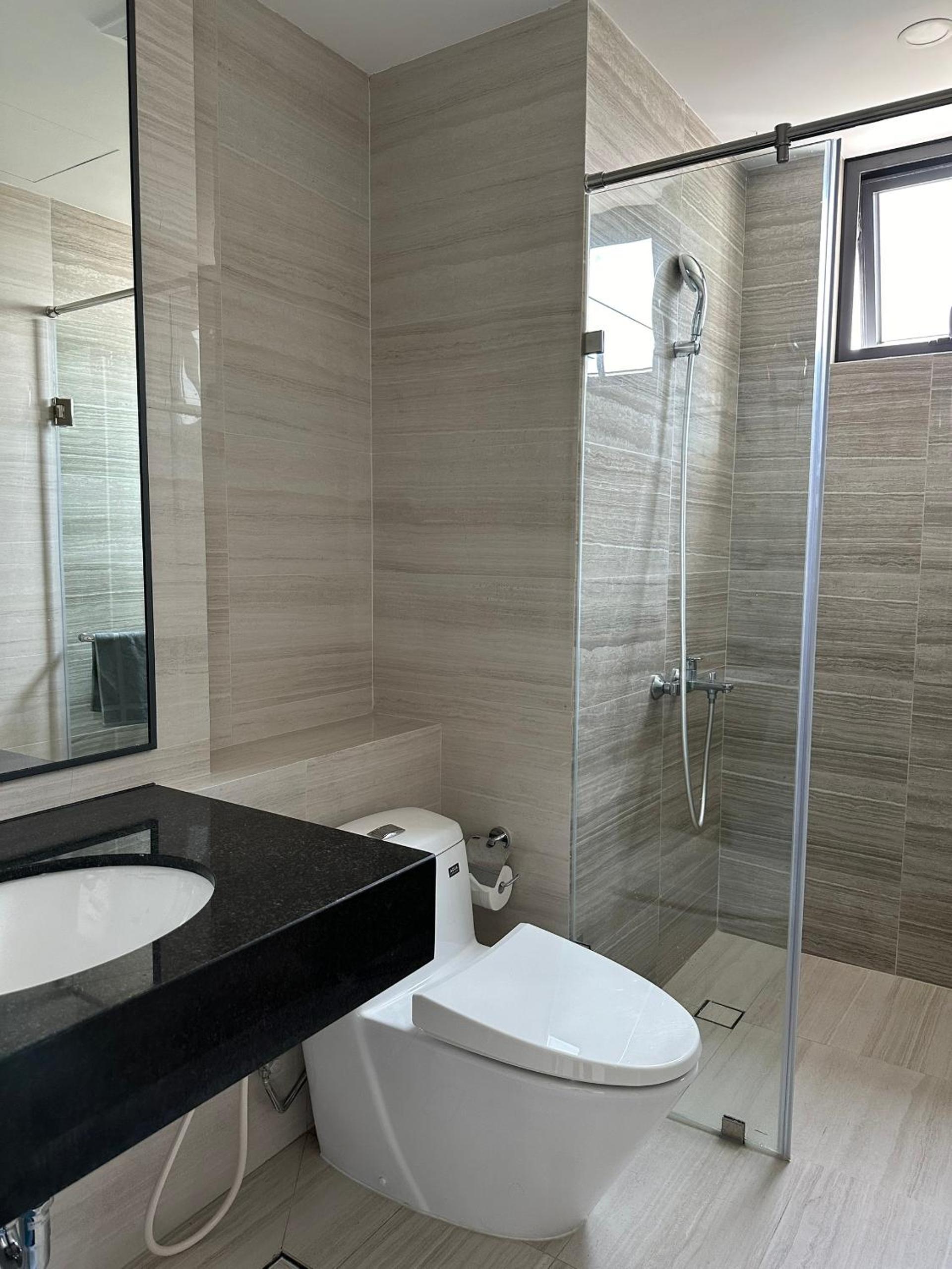 Three-Bedroom Apartment - Photo 3