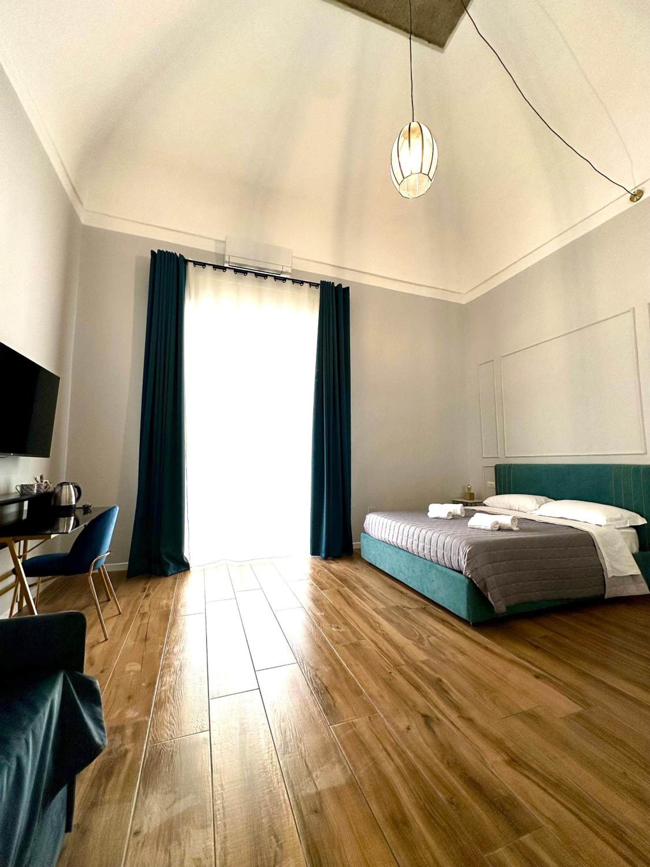 Quadruple Room with Balcony