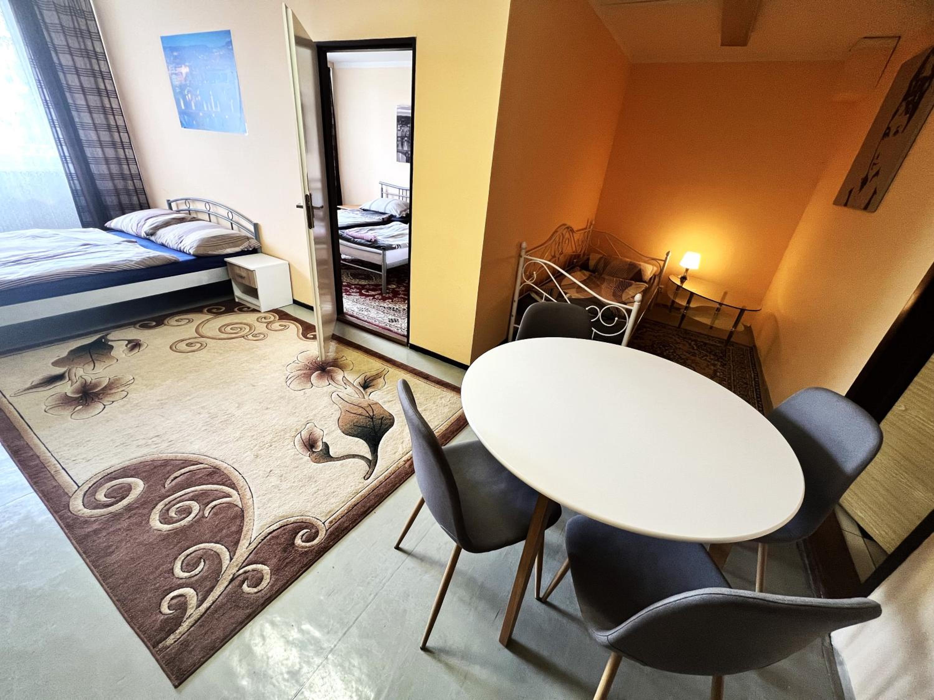 Quadruple Room with Kitchen and Balcony