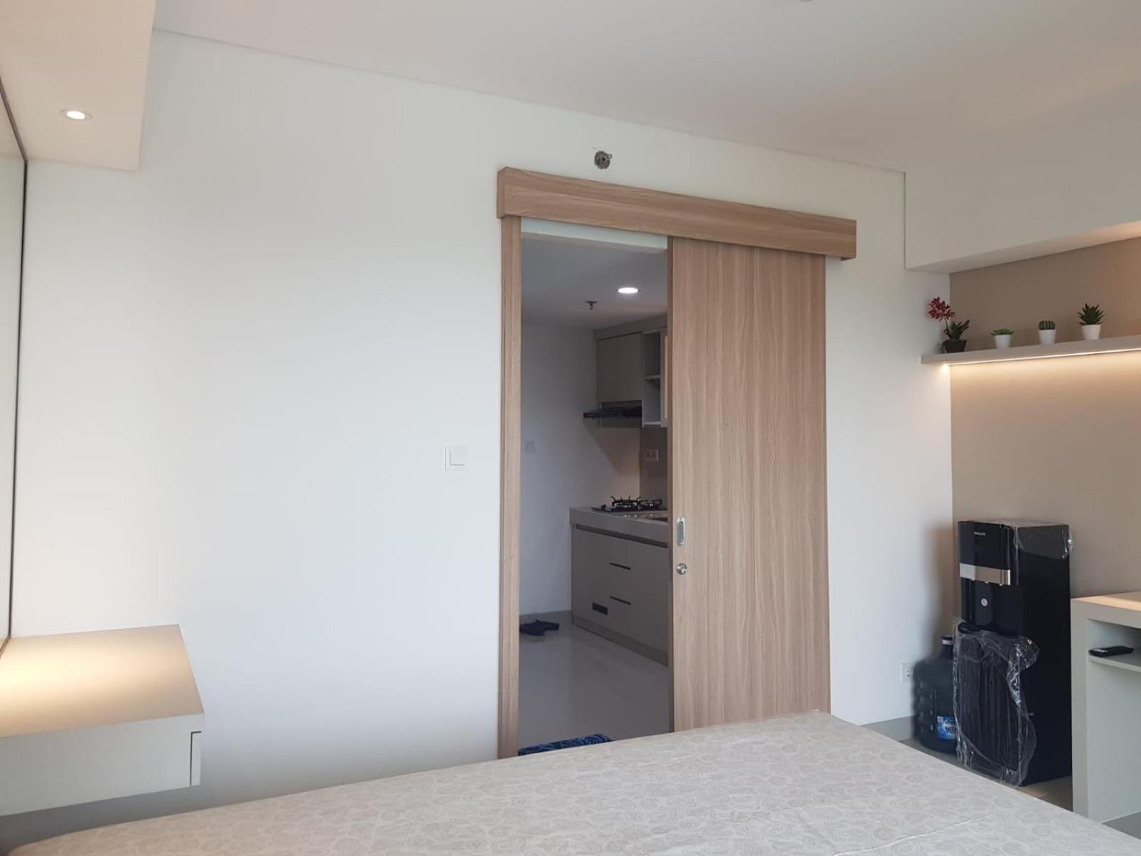 One-Bedroom Apartment with Balcony and City View