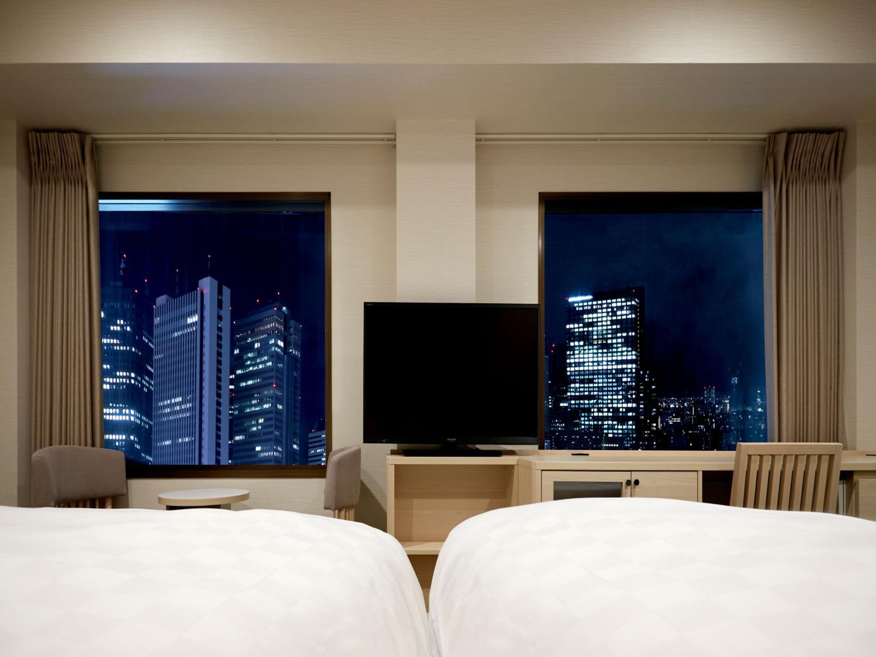 Deluxe Twin Room with Extra Bed, Non-Smoking (30.6sqm) photo 3