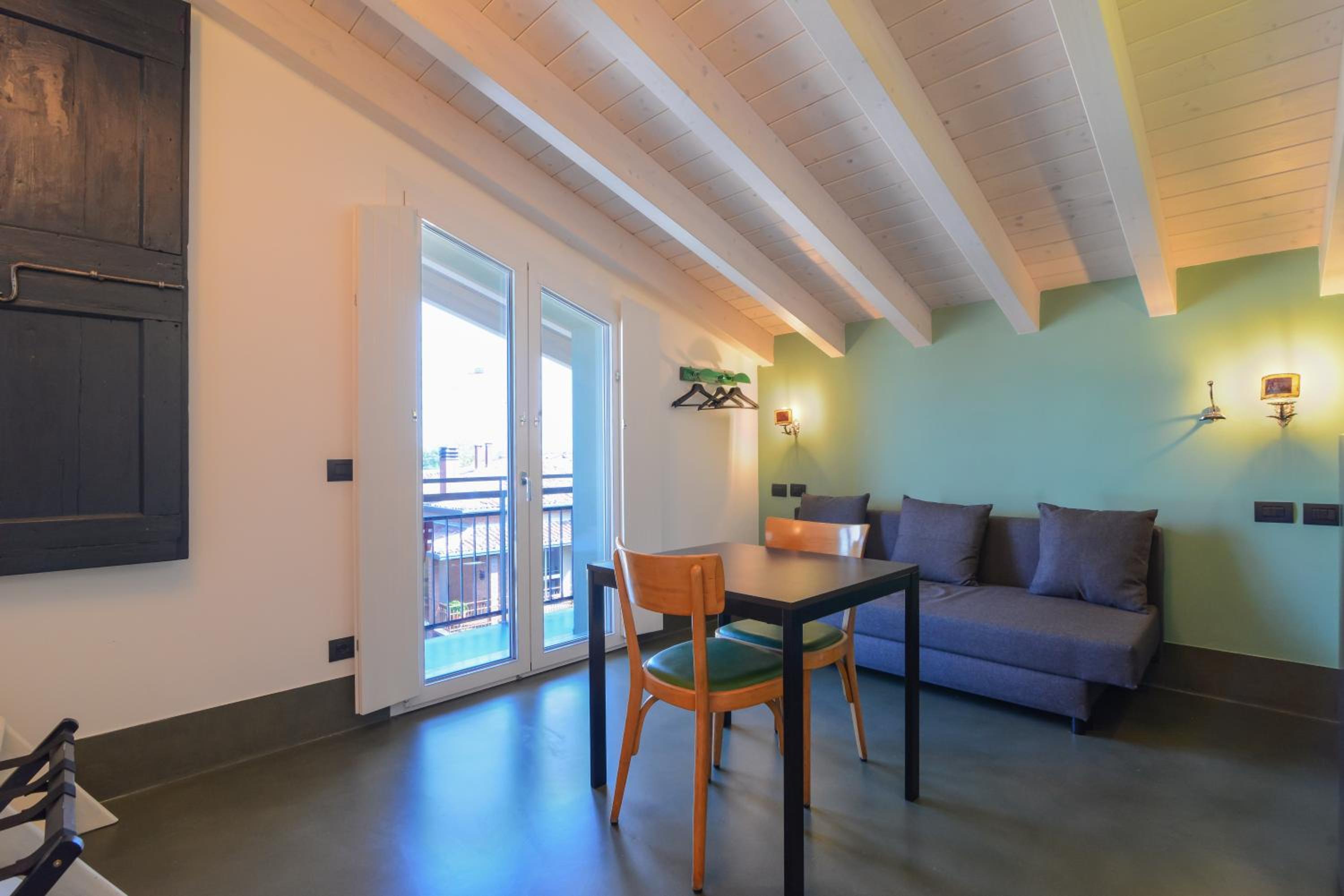 Quadruple Room with Balcony