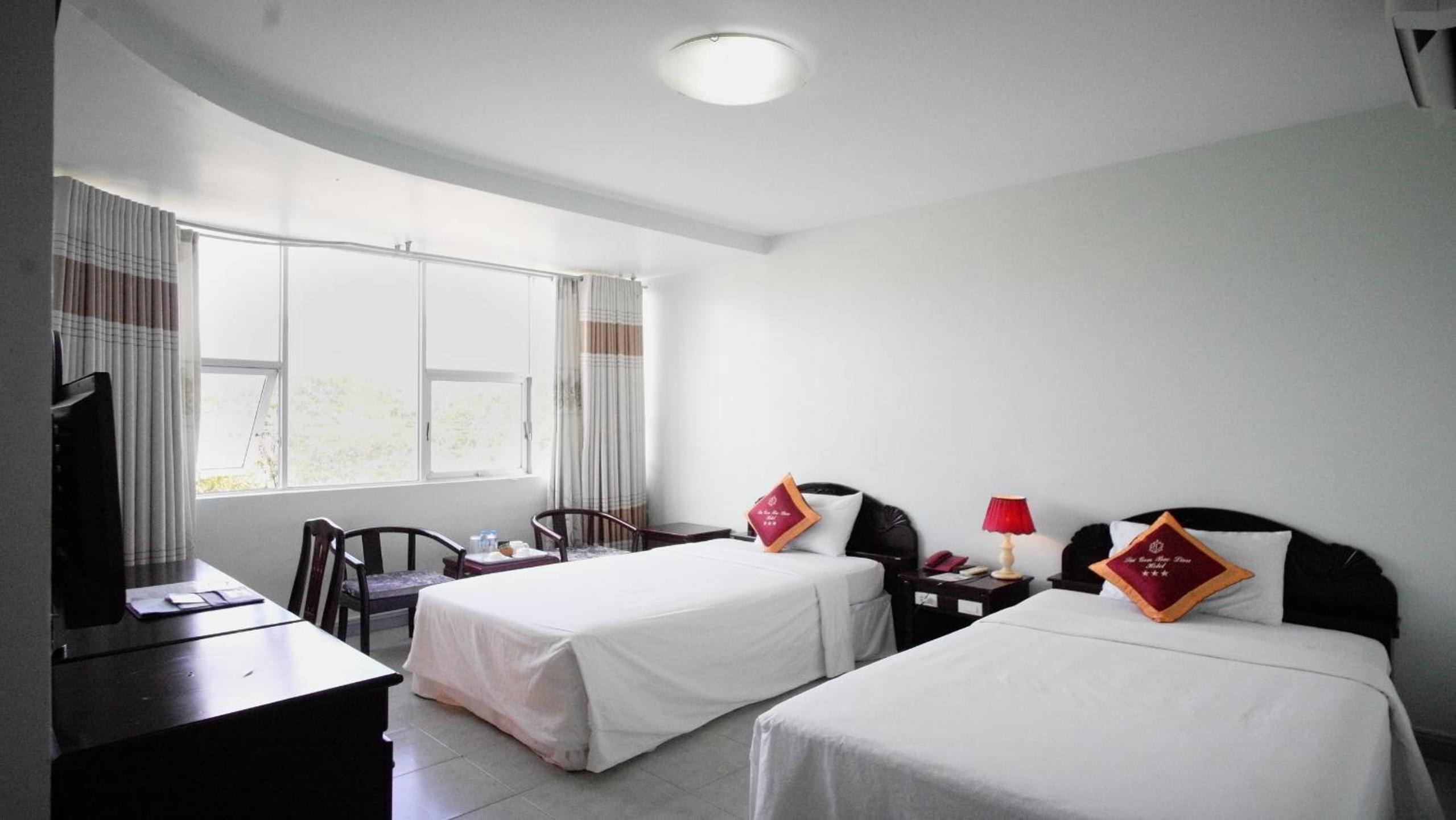 Deluxe Twin Room - Photo 8