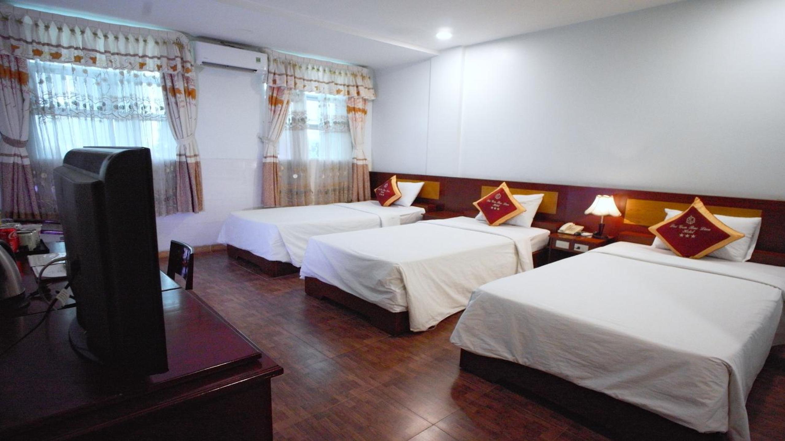 Deluxe Triple Room - Photo 2