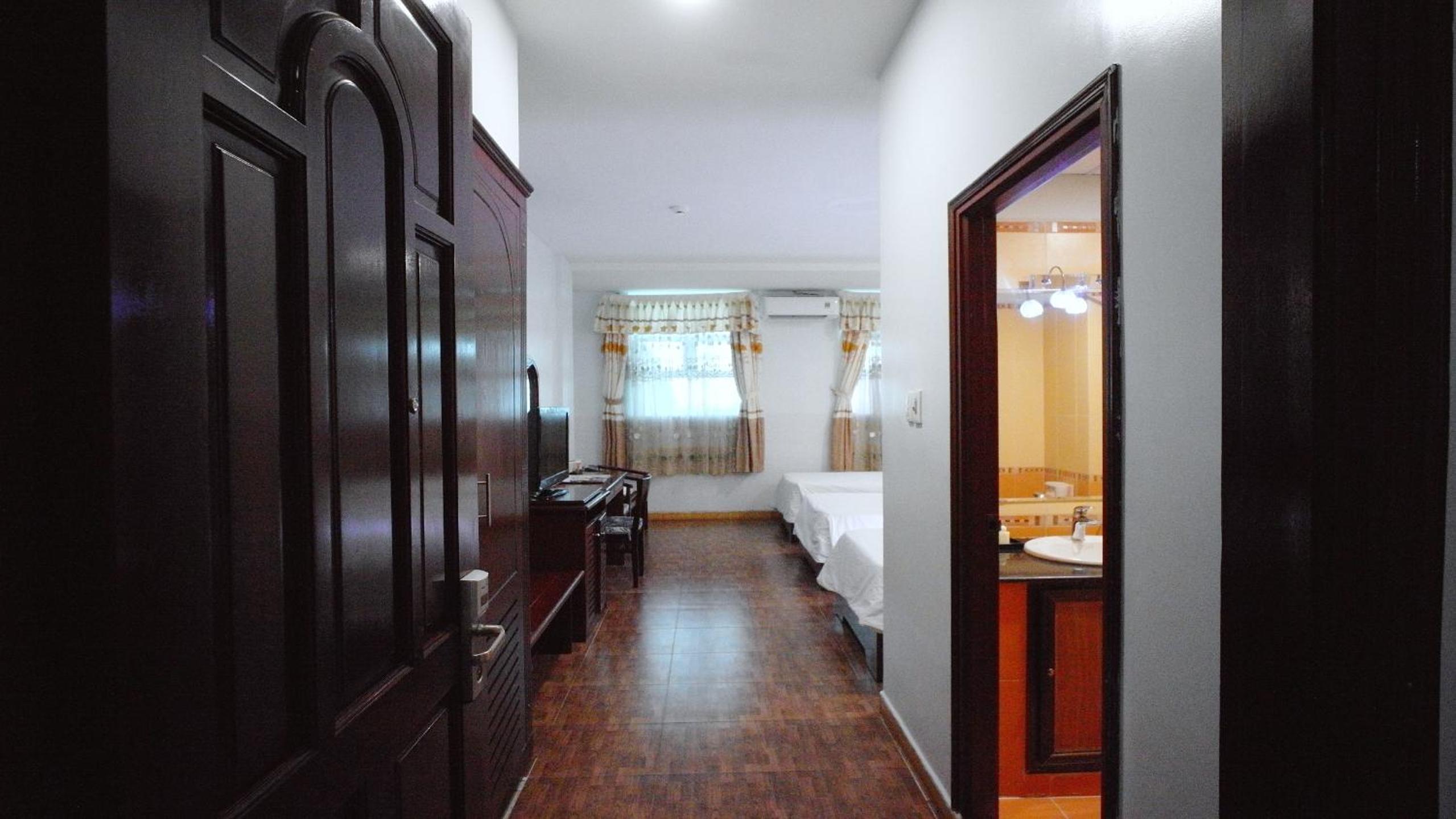 Deluxe Triple Room - Photo 1