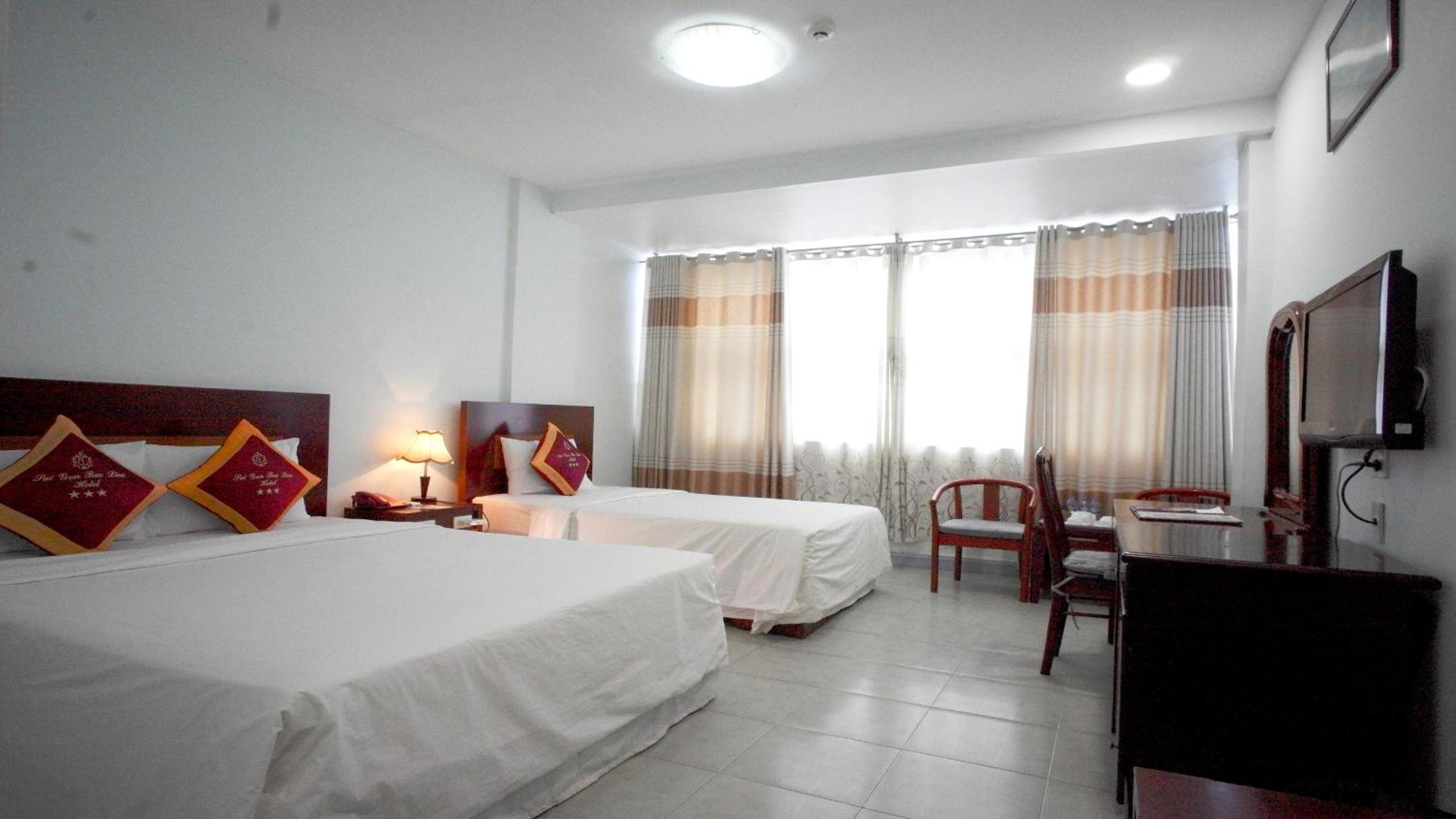 Deluxe Triple Room - Photo 9