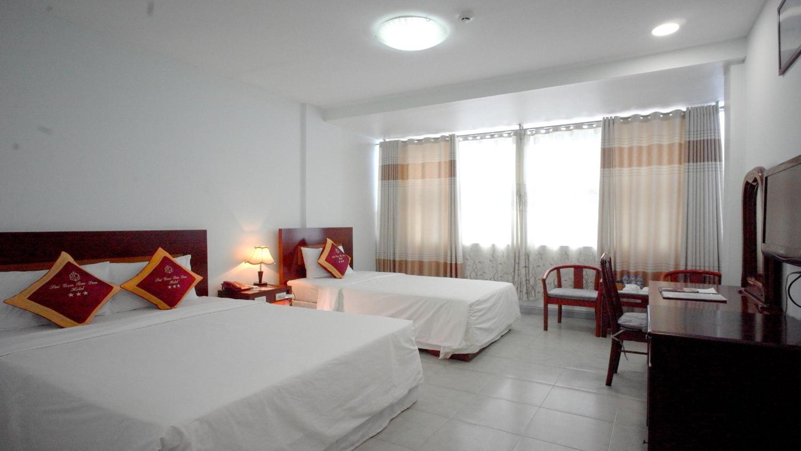 Deluxe Triple Room - Photo 8