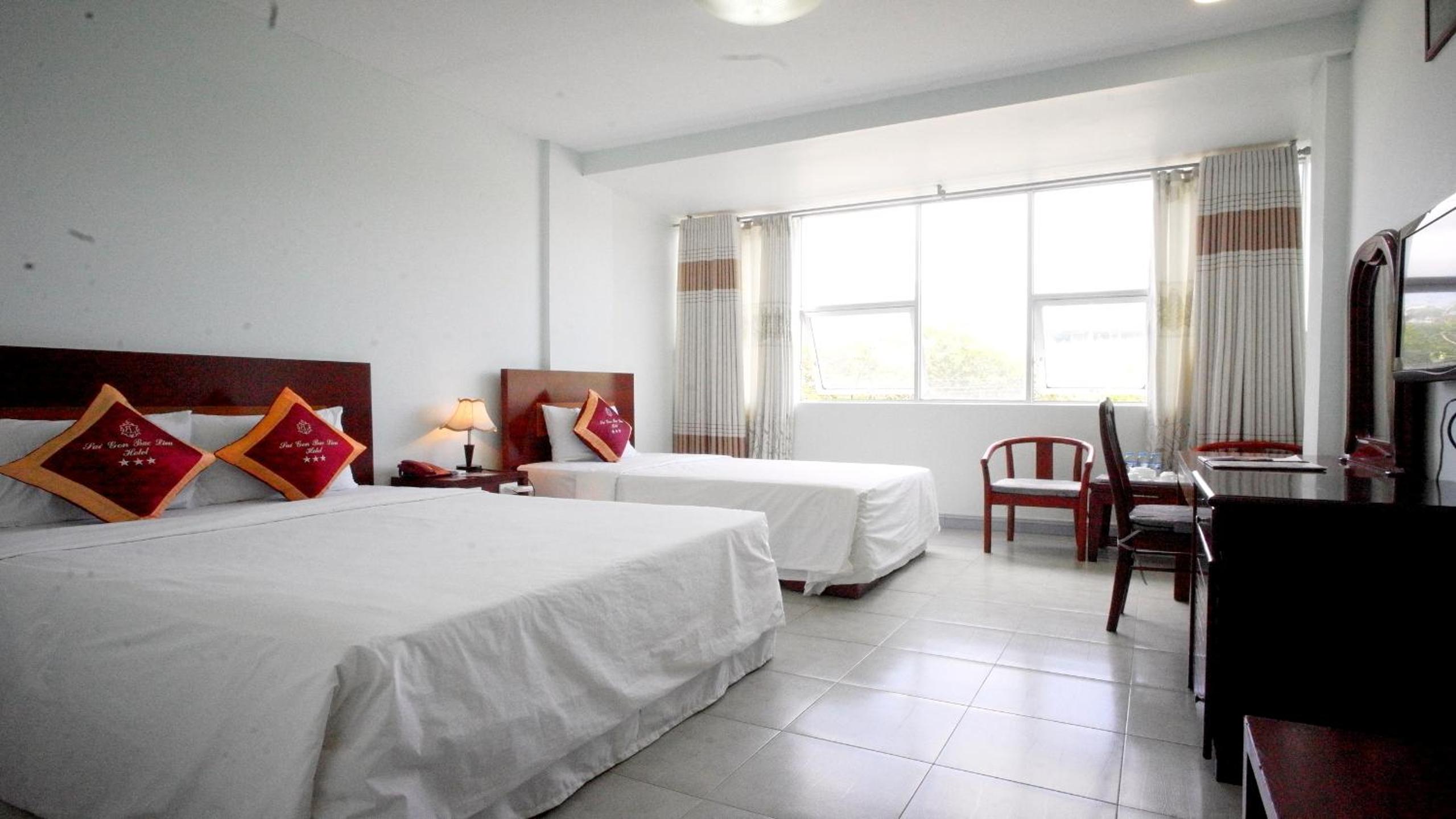 Deluxe Triple Room - Photo 10