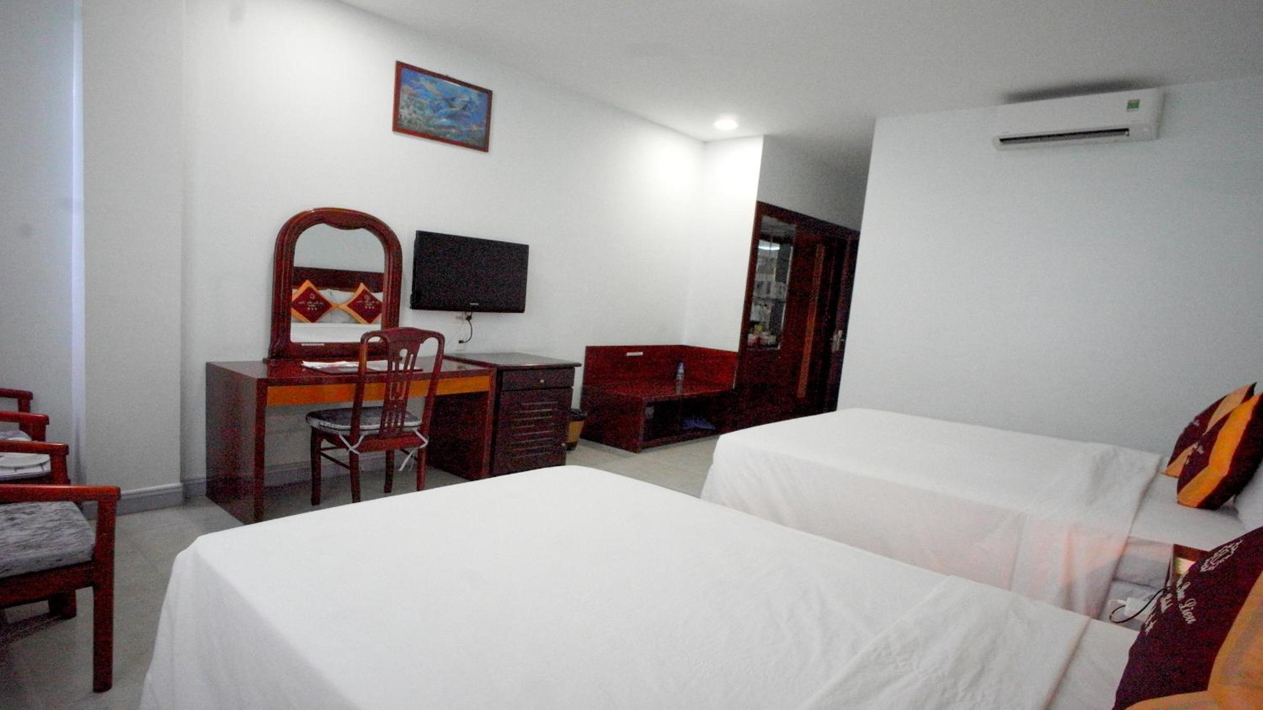 Deluxe Triple Room - Photo 7
