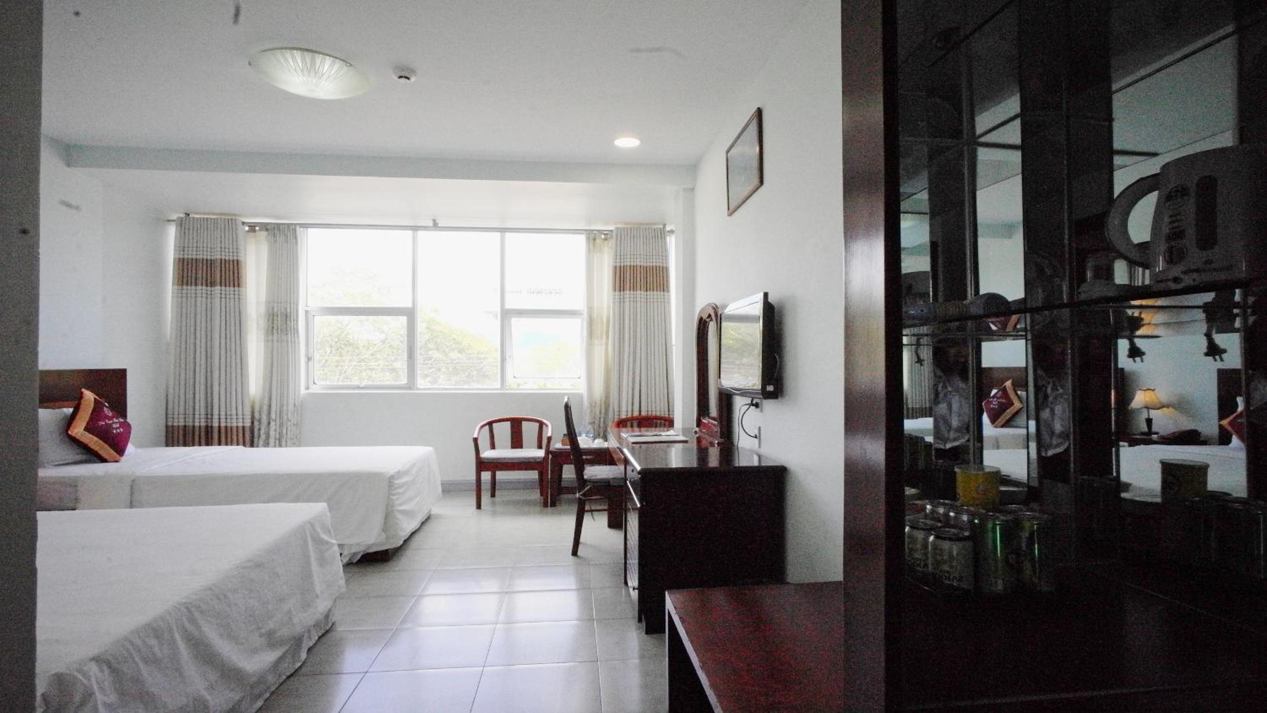 Deluxe Triple Room - Photo 5