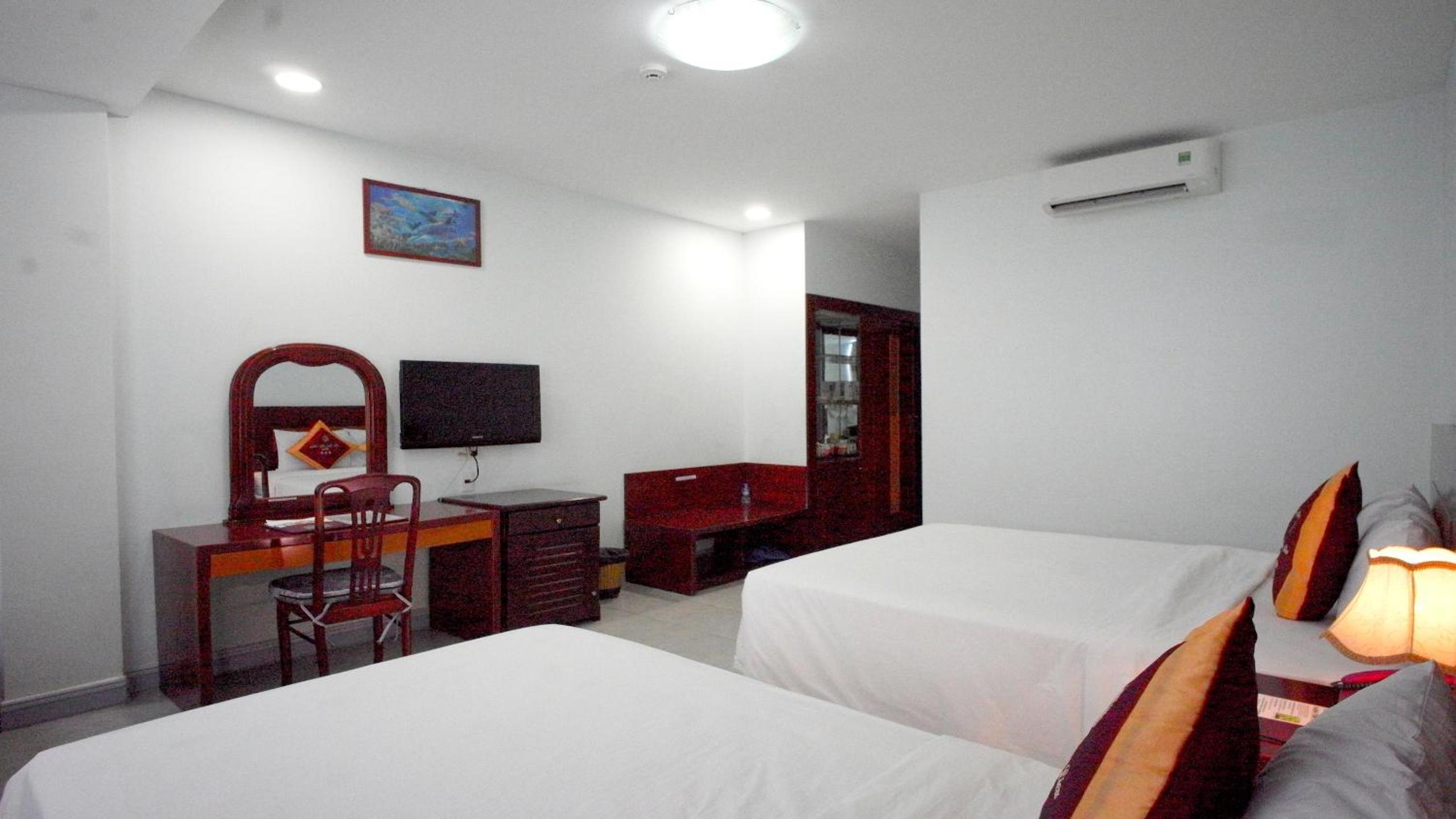 Deluxe Triple Room - Photo 4