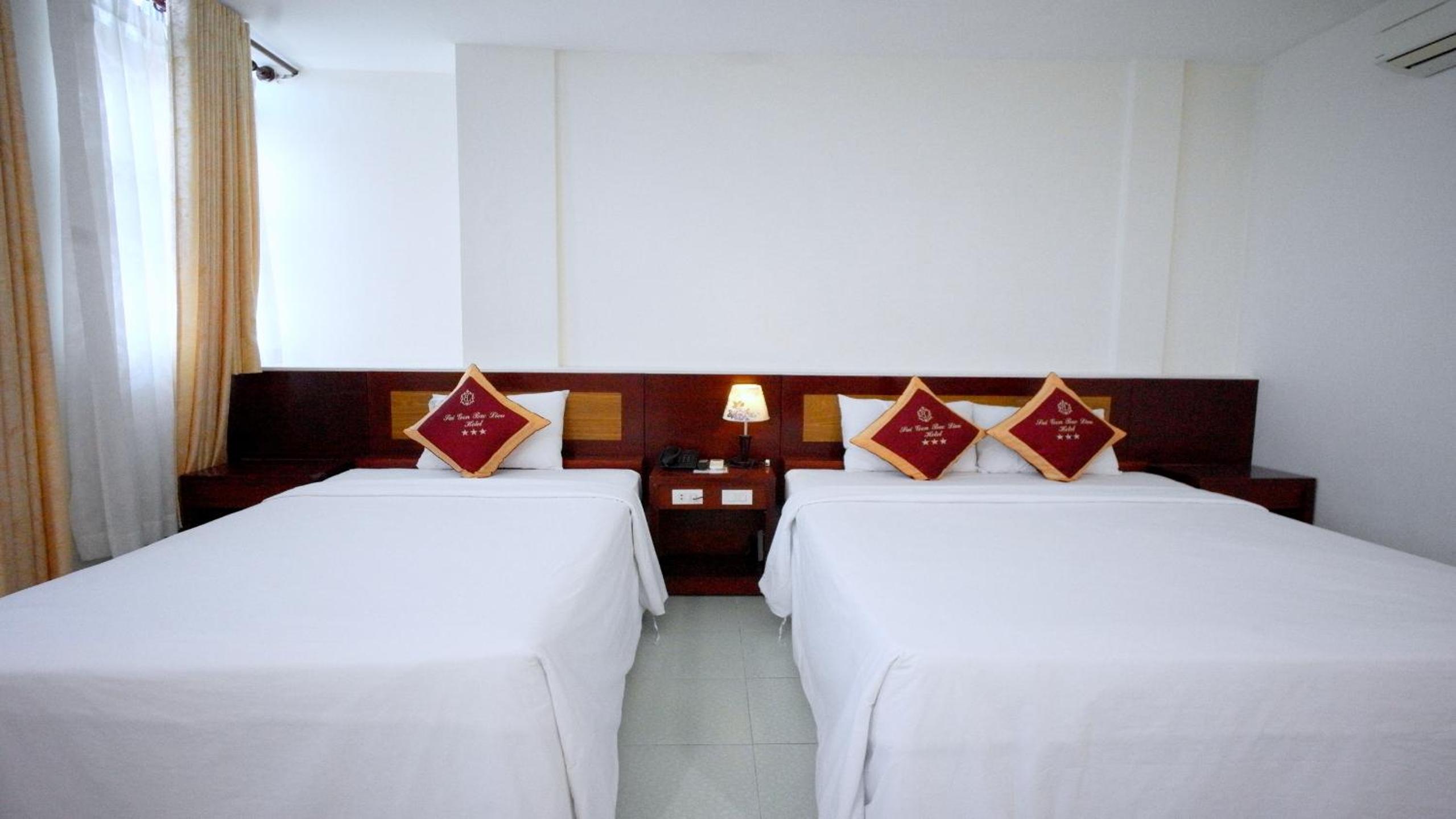 Deluxe Triple Room - Photo 16