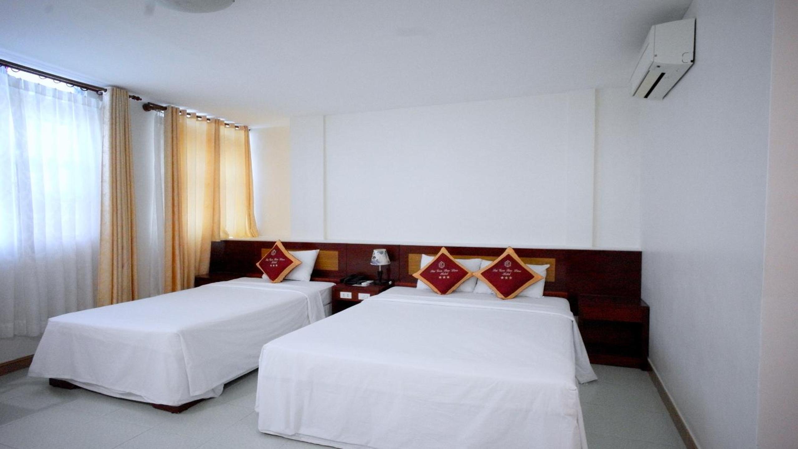 Deluxe Triple Room - Photo 15
