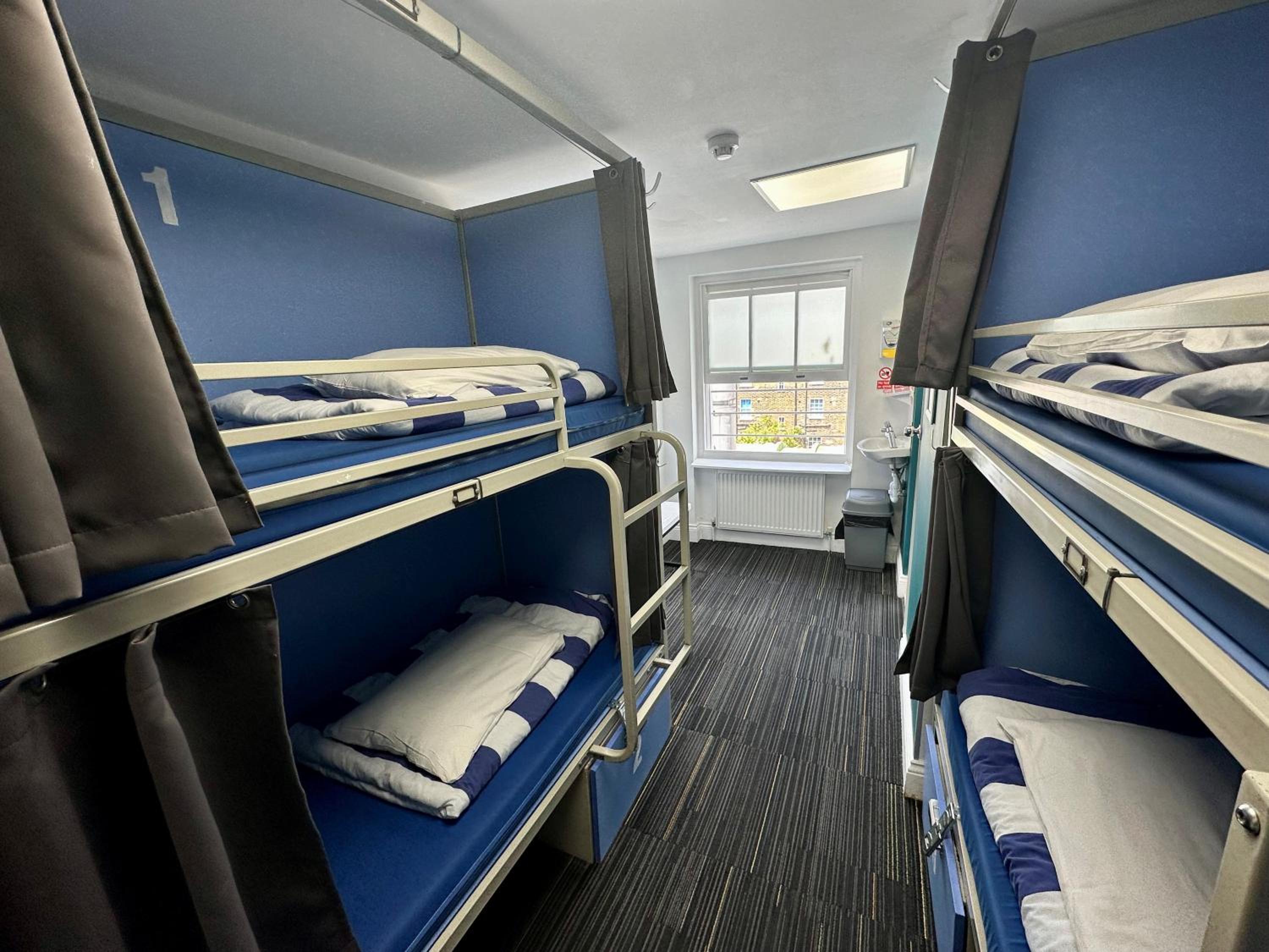 4-Bed Mixed Dormitory Room with Private Bathroom photo 1