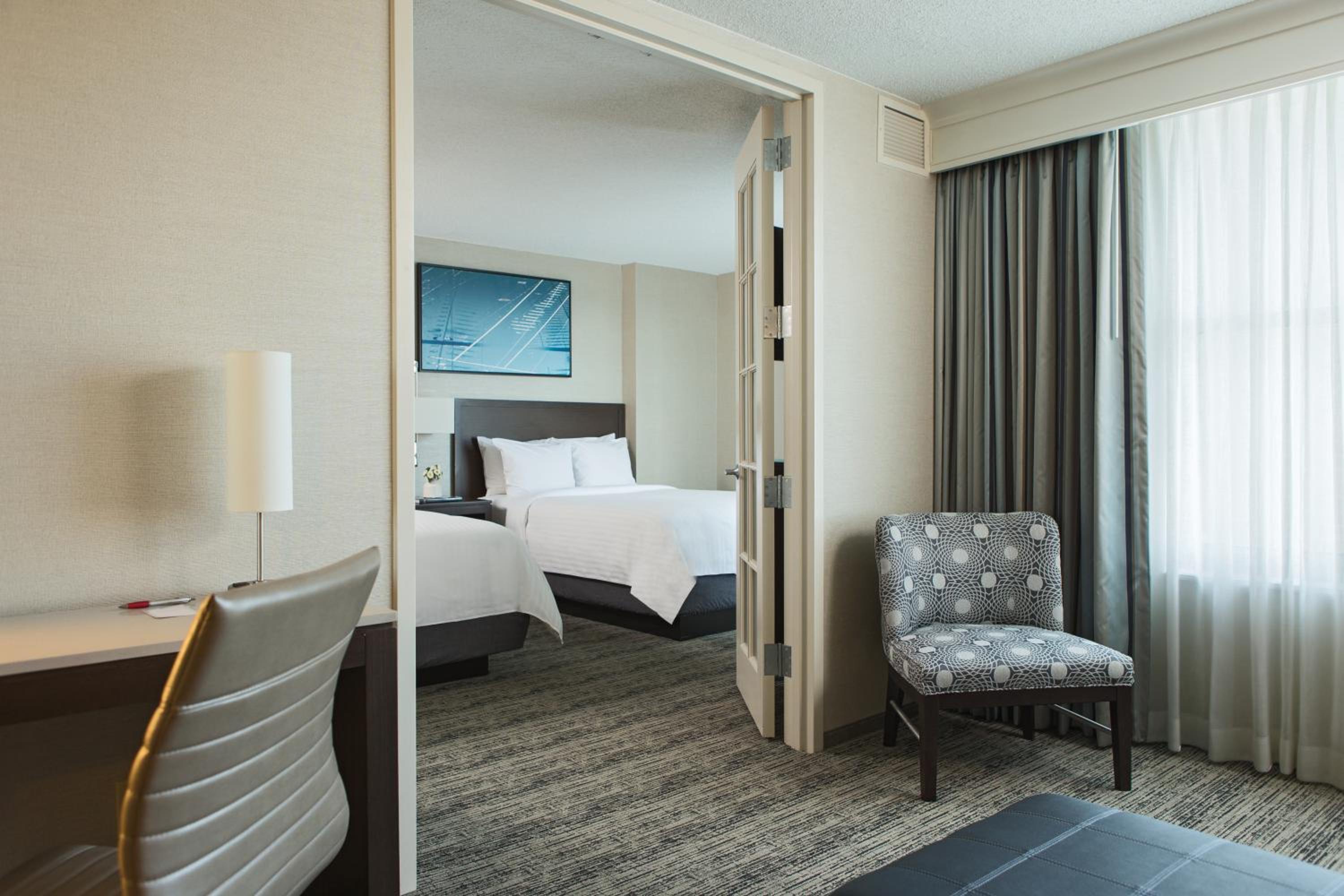 Two Room Suite with Two Double Beds and Sofa Bed - Photo 2