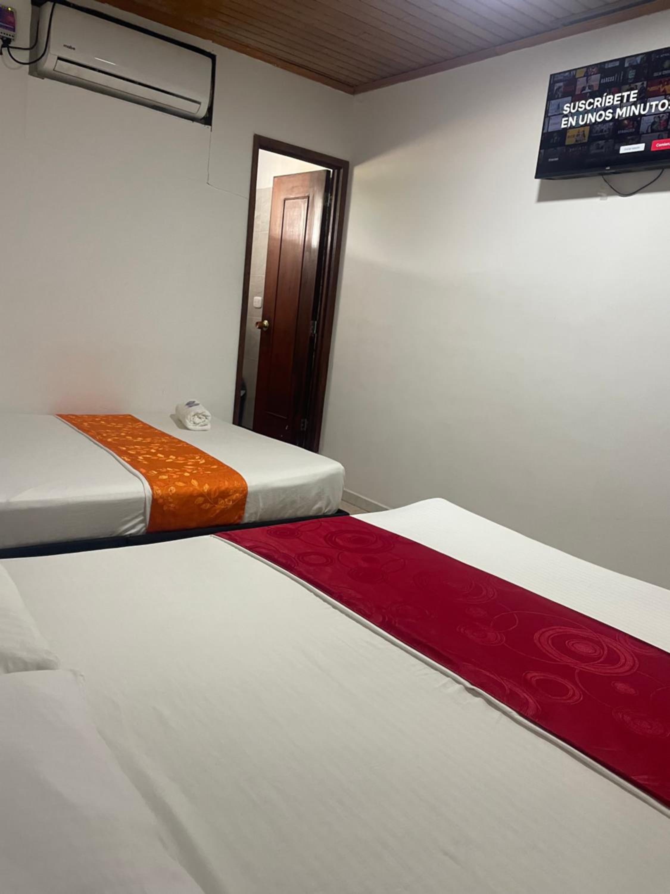 Deluxe Queen Room with Two Queen Beds photo 1