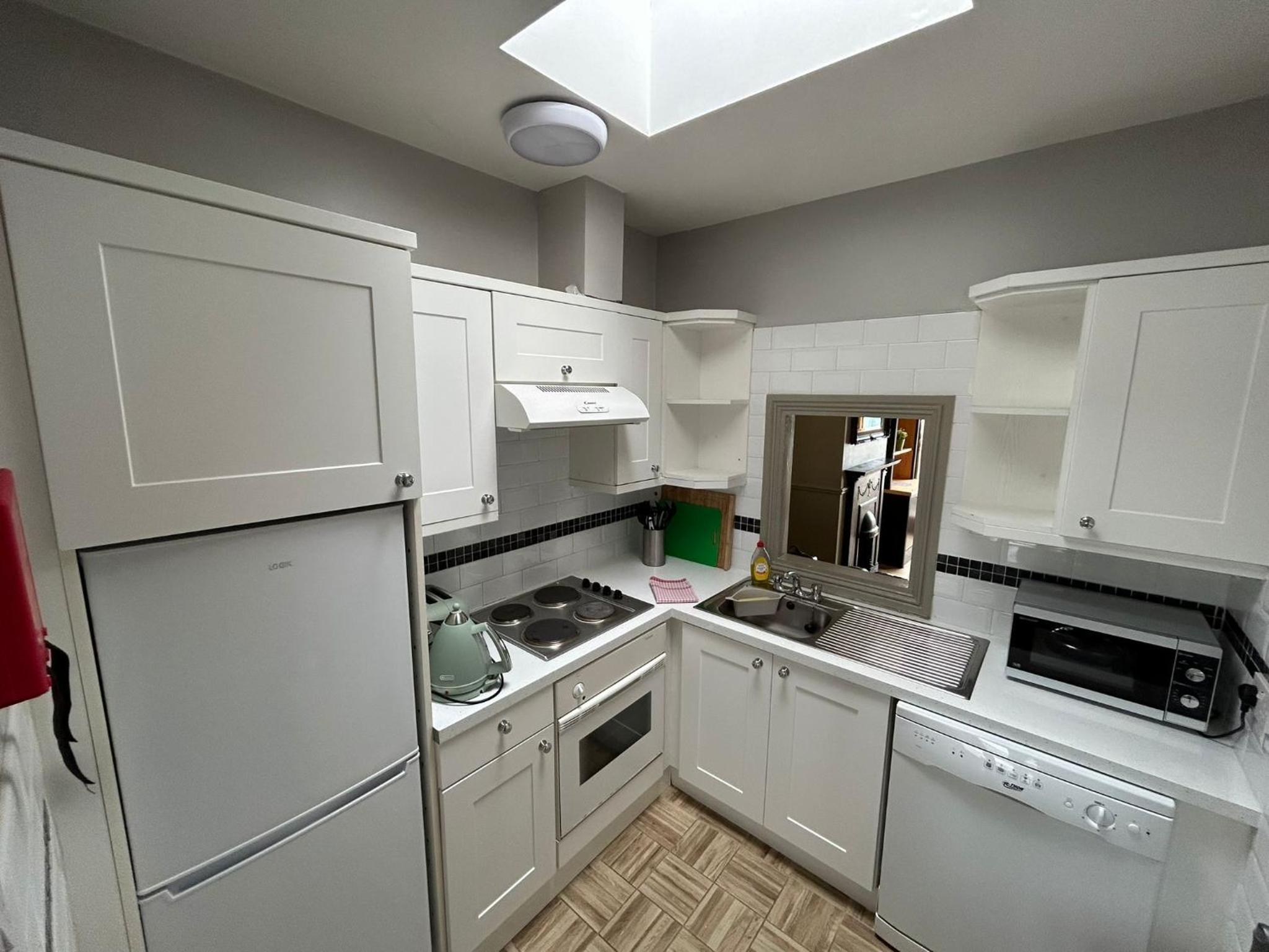 Three-Bedroom Apartment photo 2
