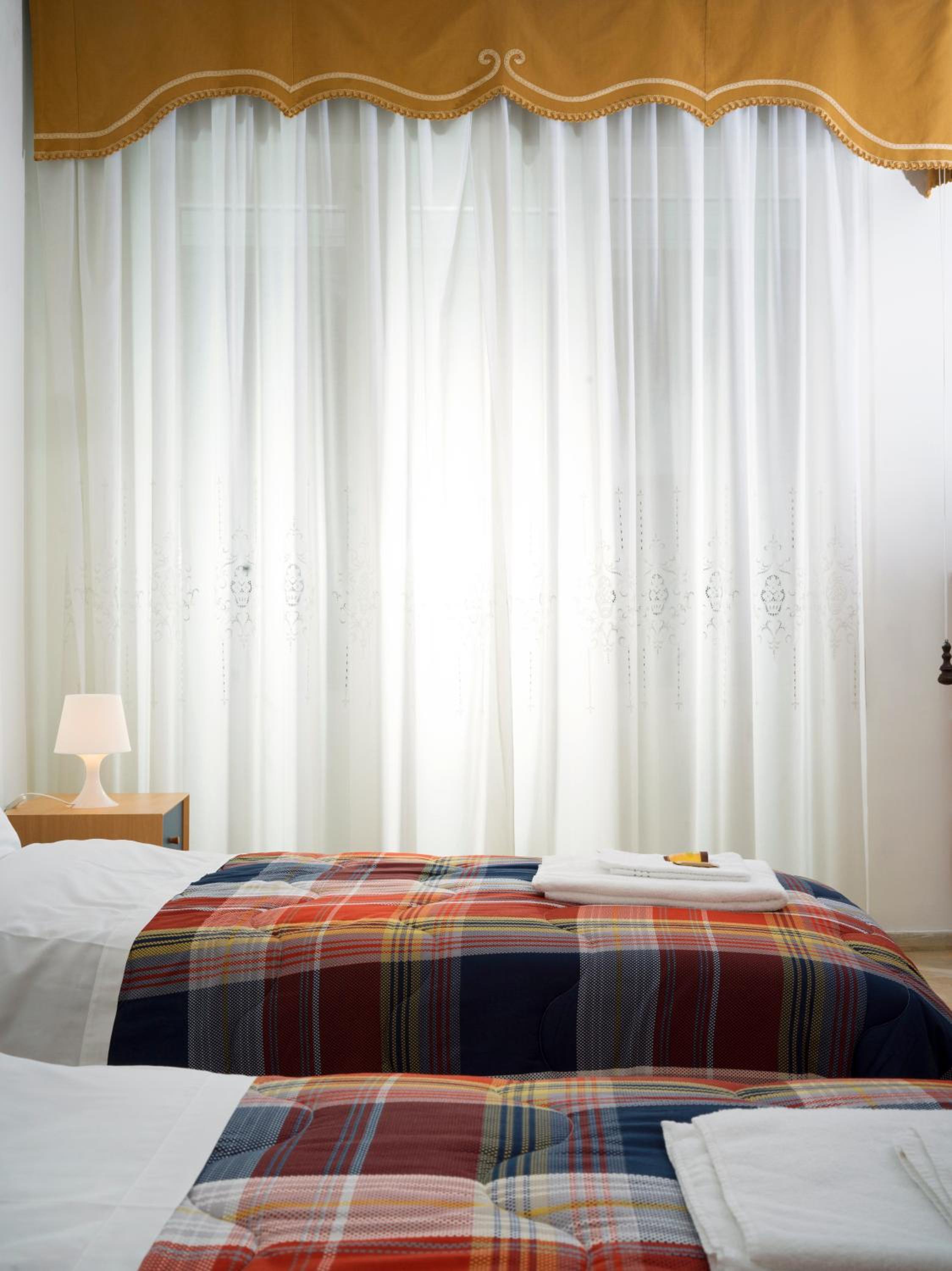 Twin Room With Balcony And Shared Bathroom