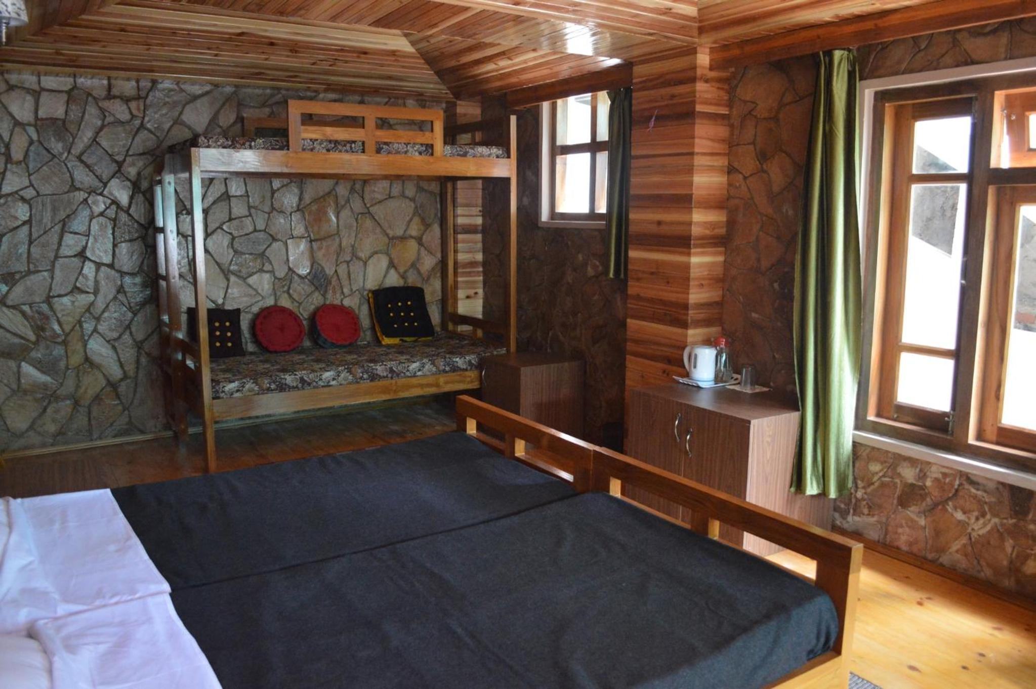 Deluxe Quadruple Room - Photo 6