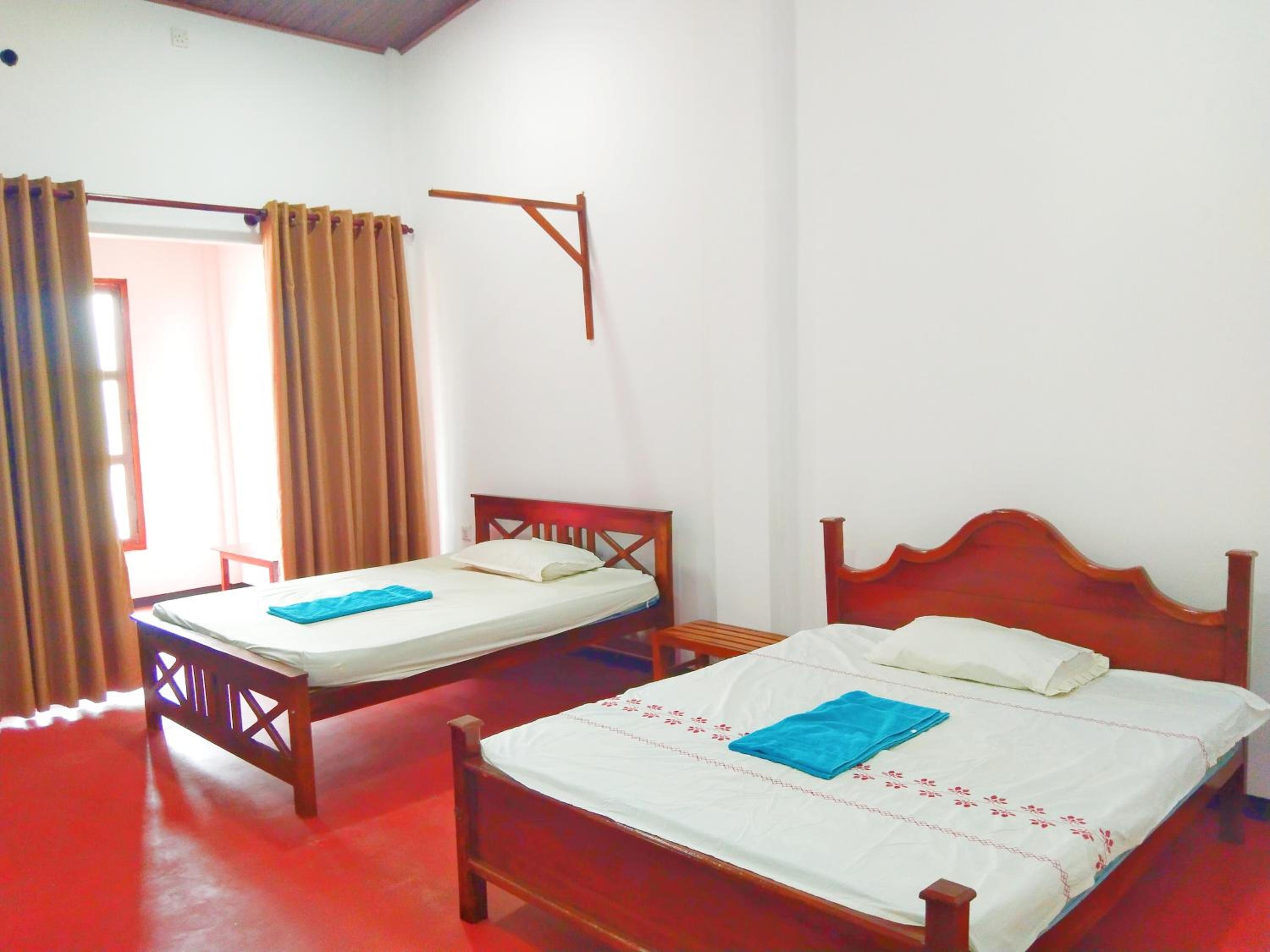 Deluxe Queen Room With Two Queen Beds photo 1