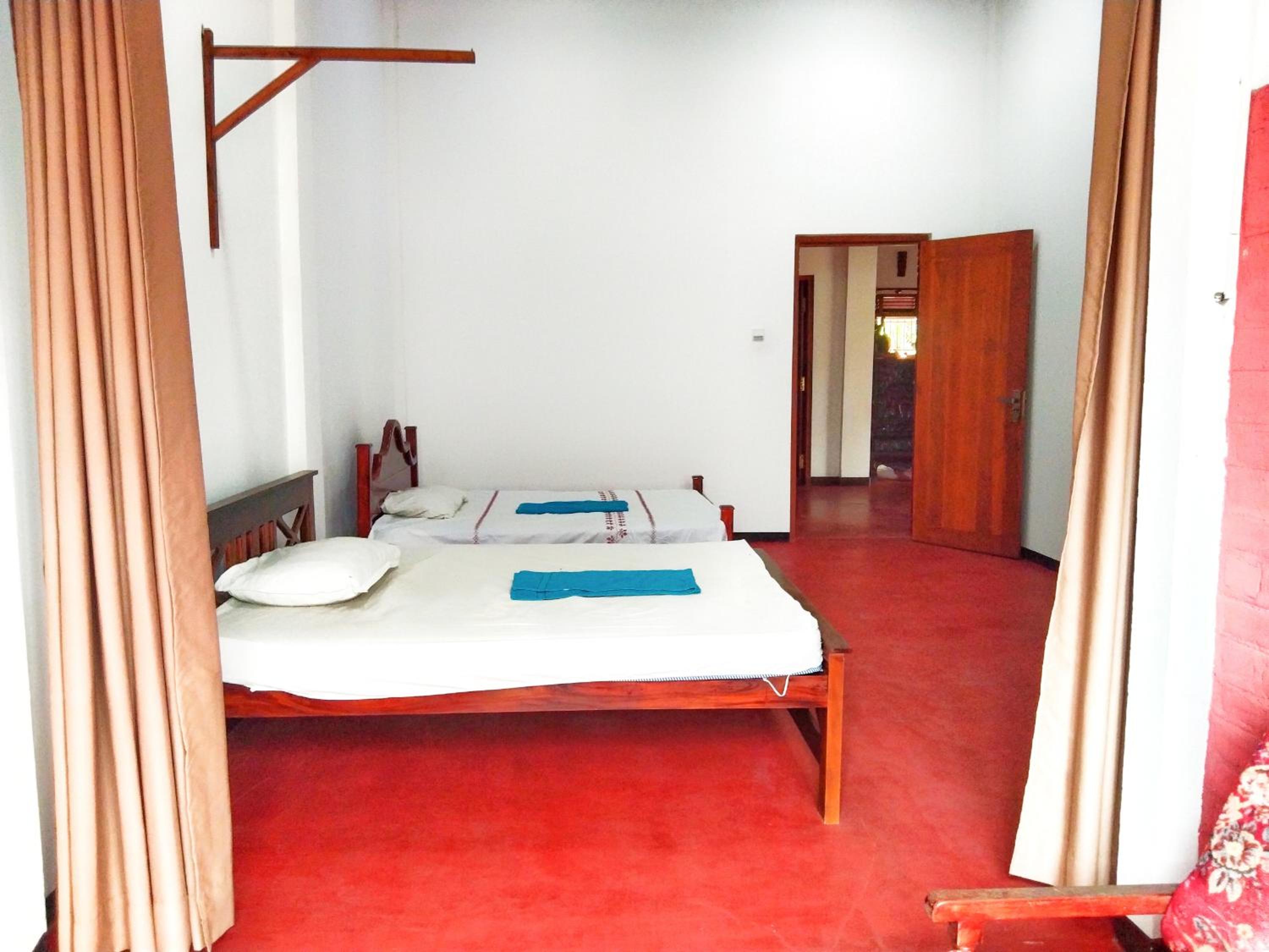 Deluxe Queen Room With Two Queen Beds photo 2
