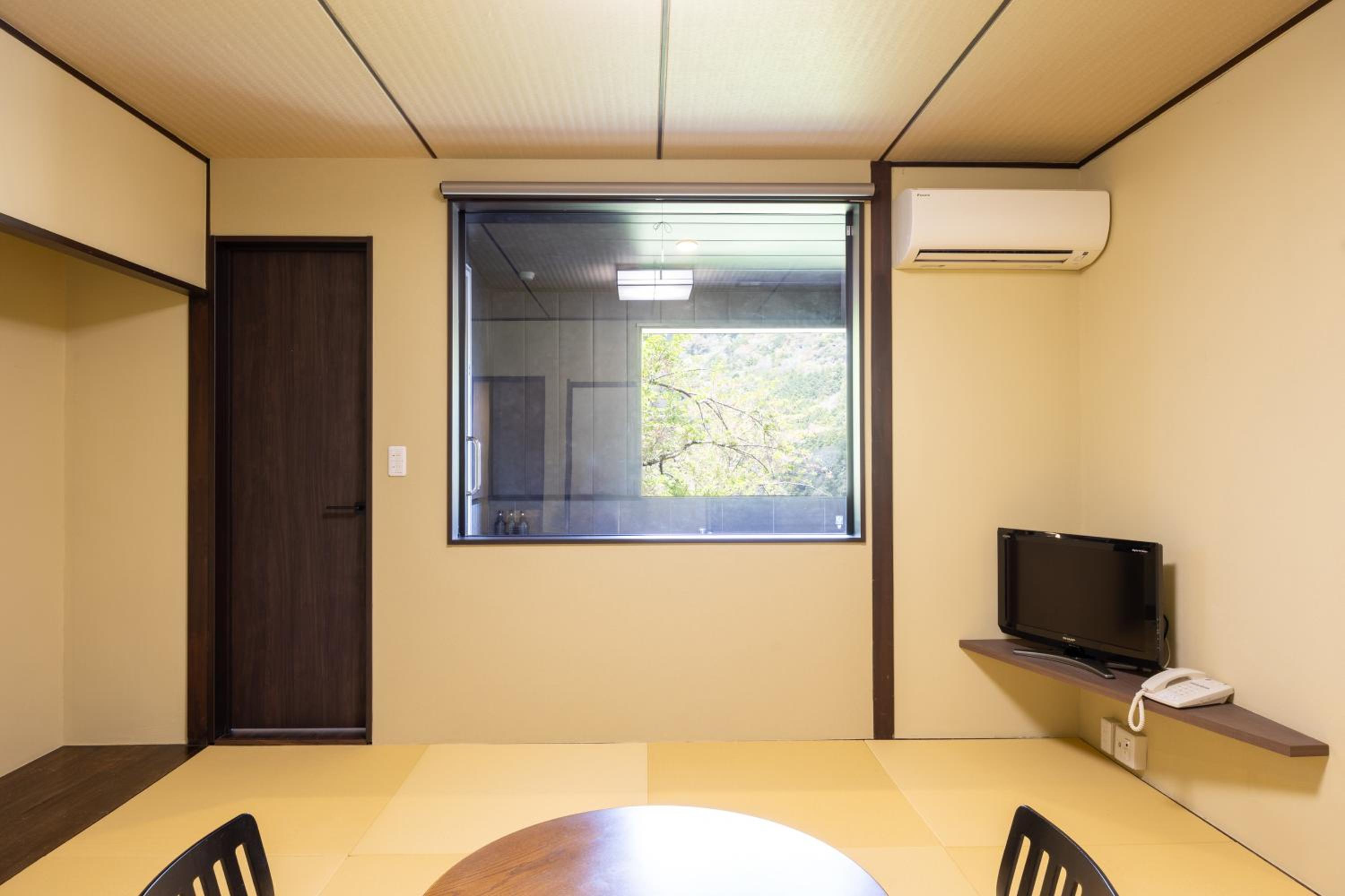 Quadruple Room with Private External Bathroom - Photo 1