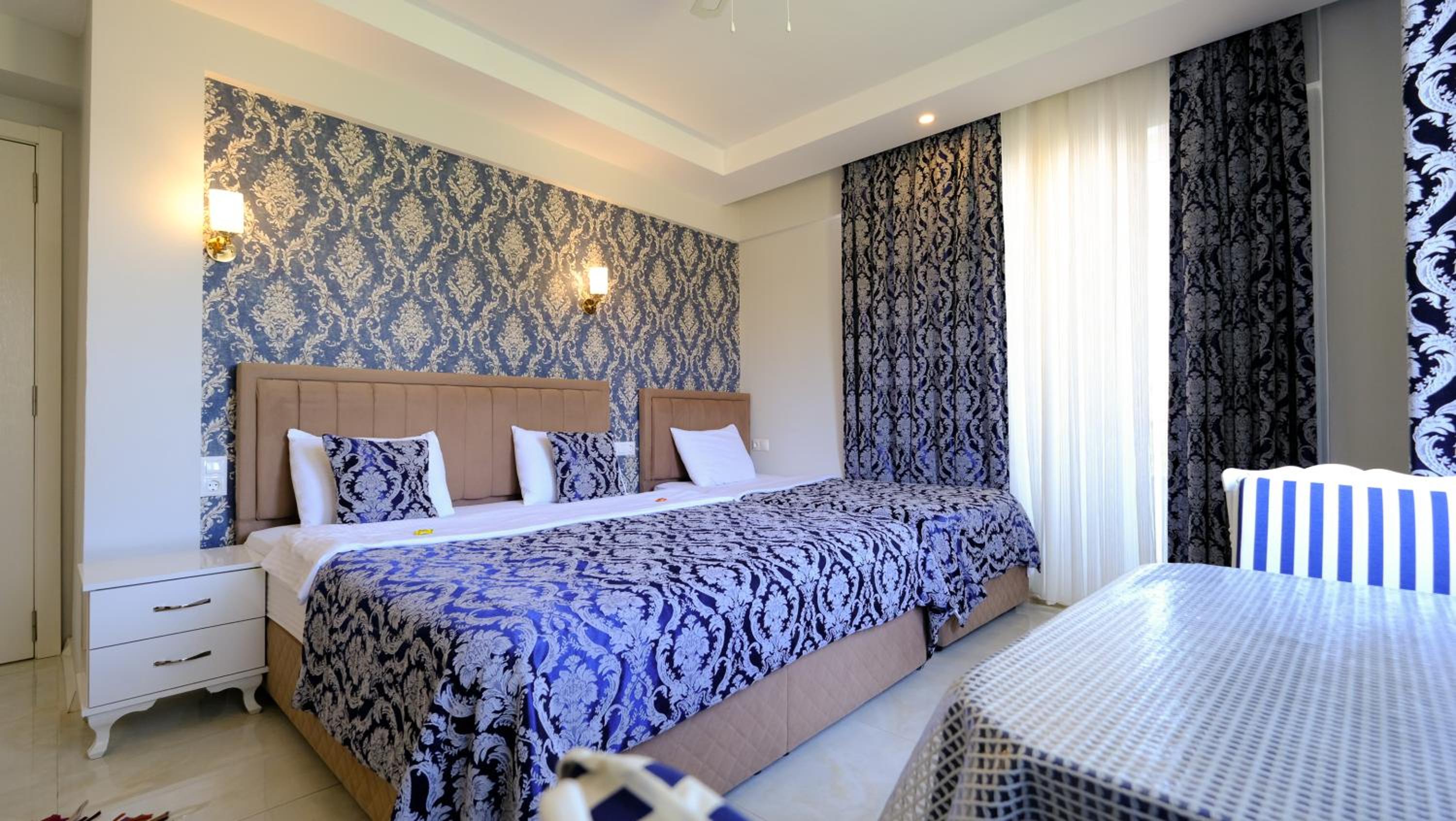 Deluxe Triple Room - Photo 15