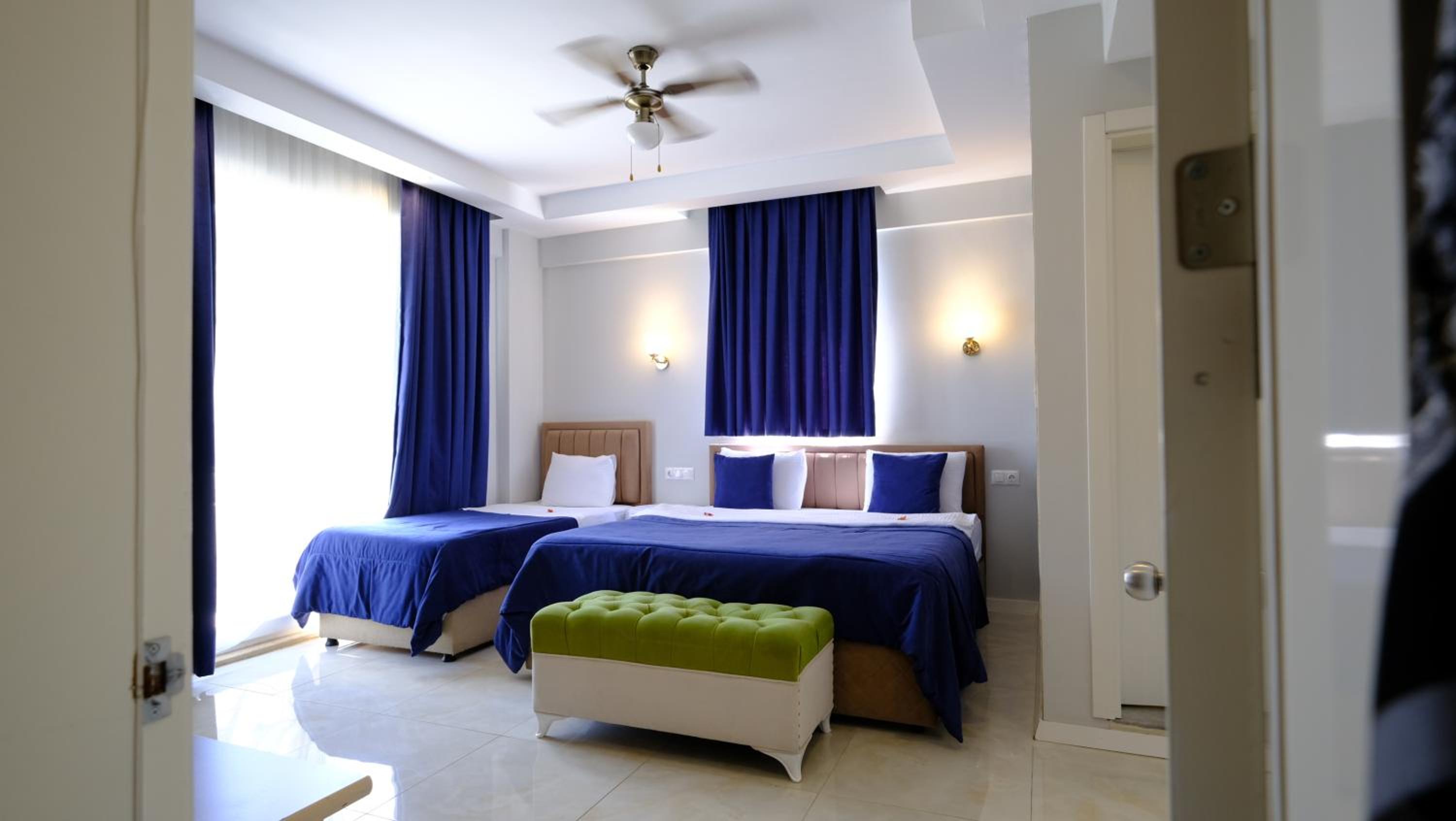 Deluxe Triple Room - Photo 7