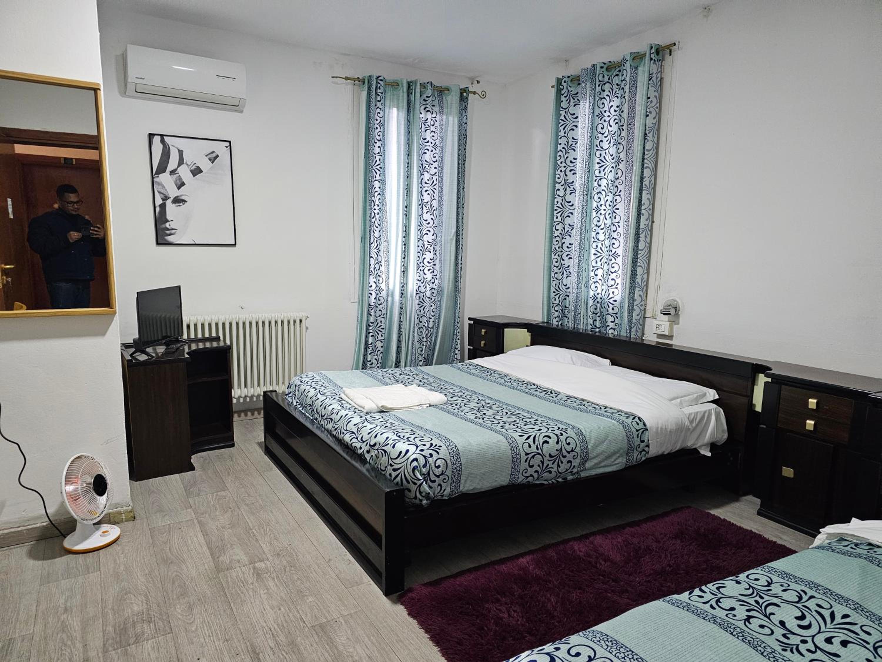 Quadruple Room with Private Bathroom - Photo 1