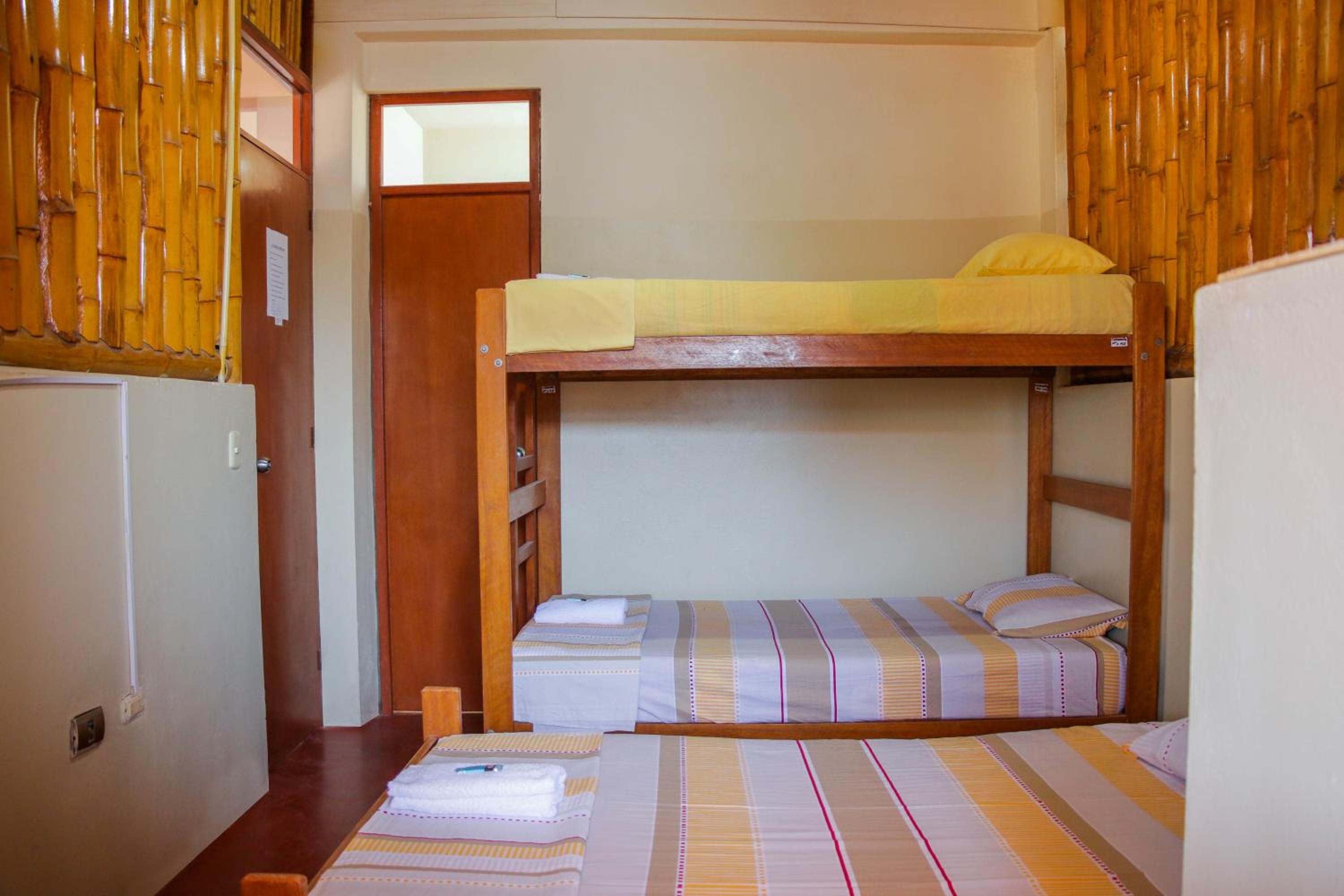 Single Bed In Male Dormitory Room