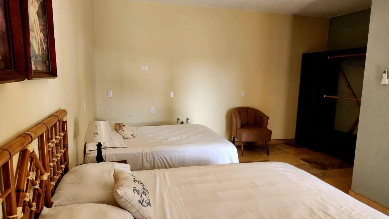 Deluxe Queen Room with Two Queen Beds - Photo 14