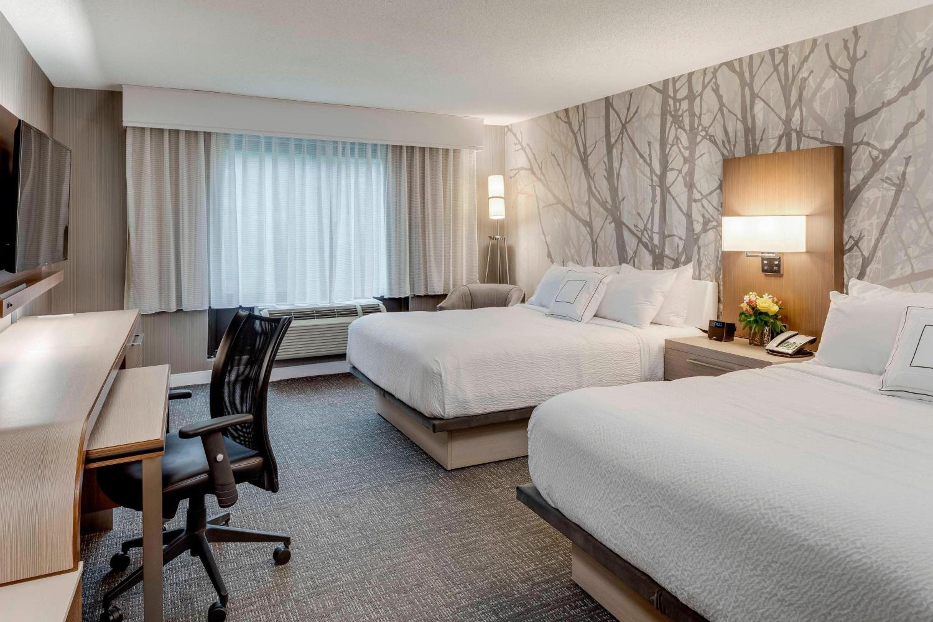 Queen Room with Two Queen Beds - Photo 1
