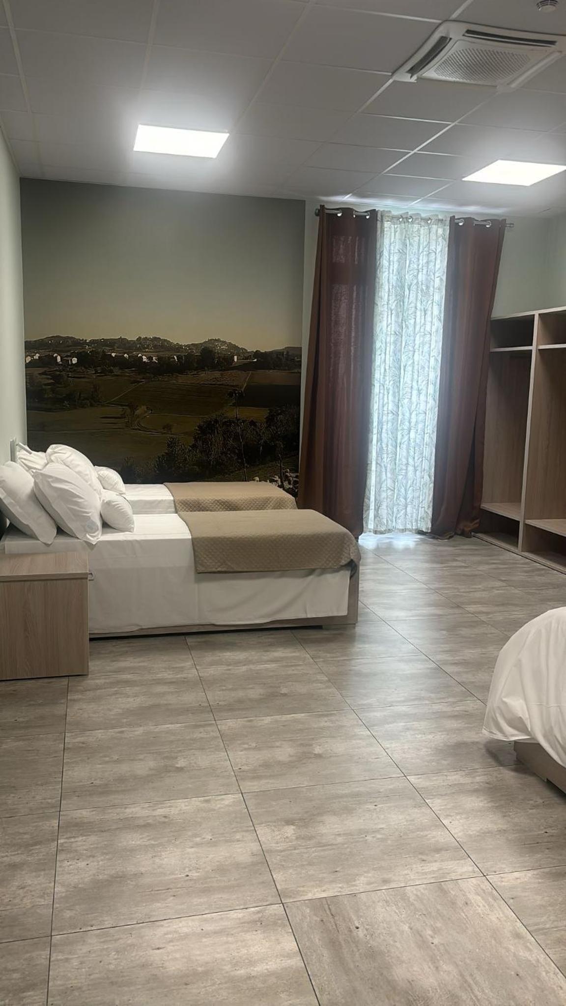 Quadruple Room with Private Bathroom photo 1