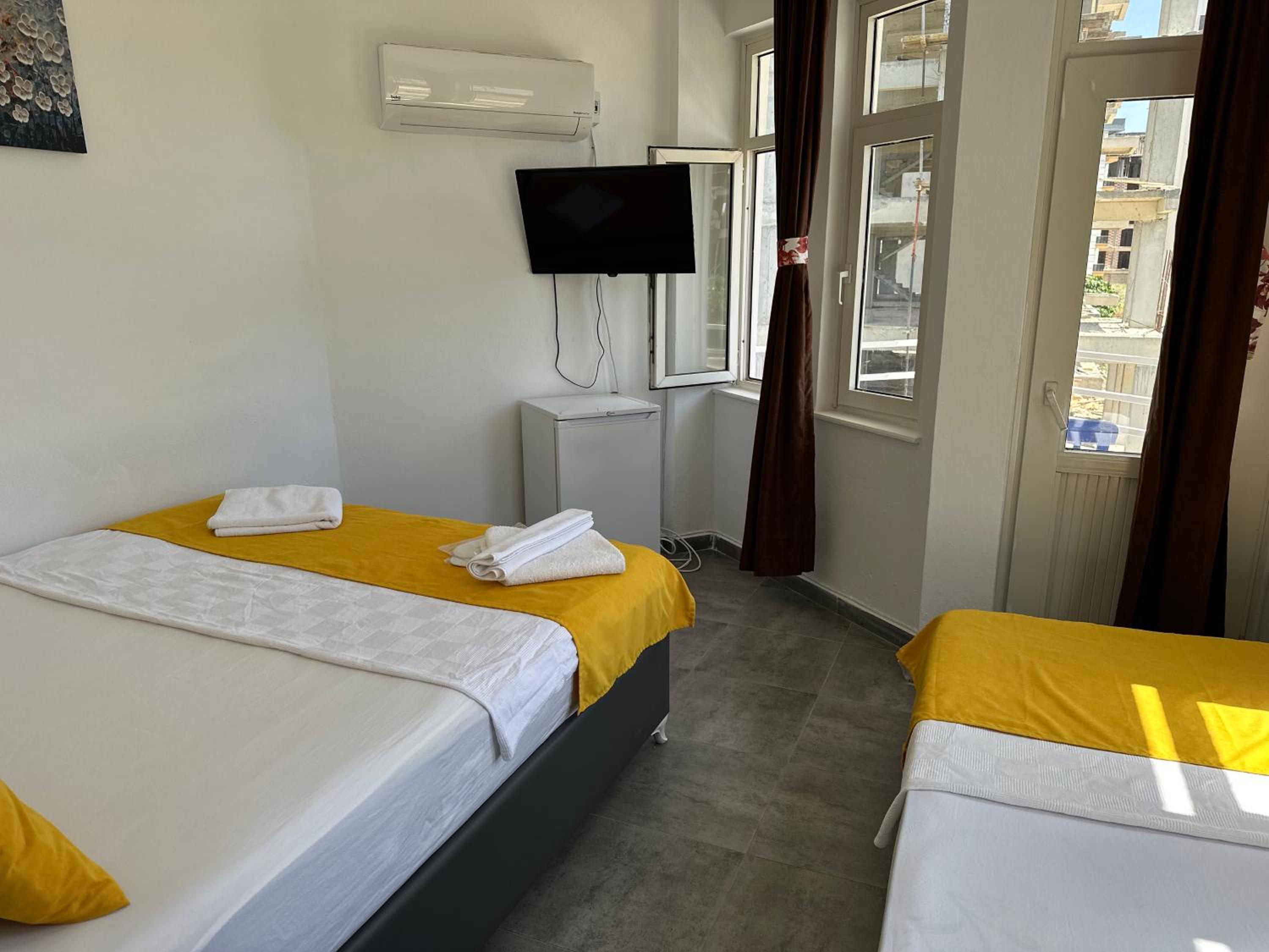 Standard Triple Room - Photo 9