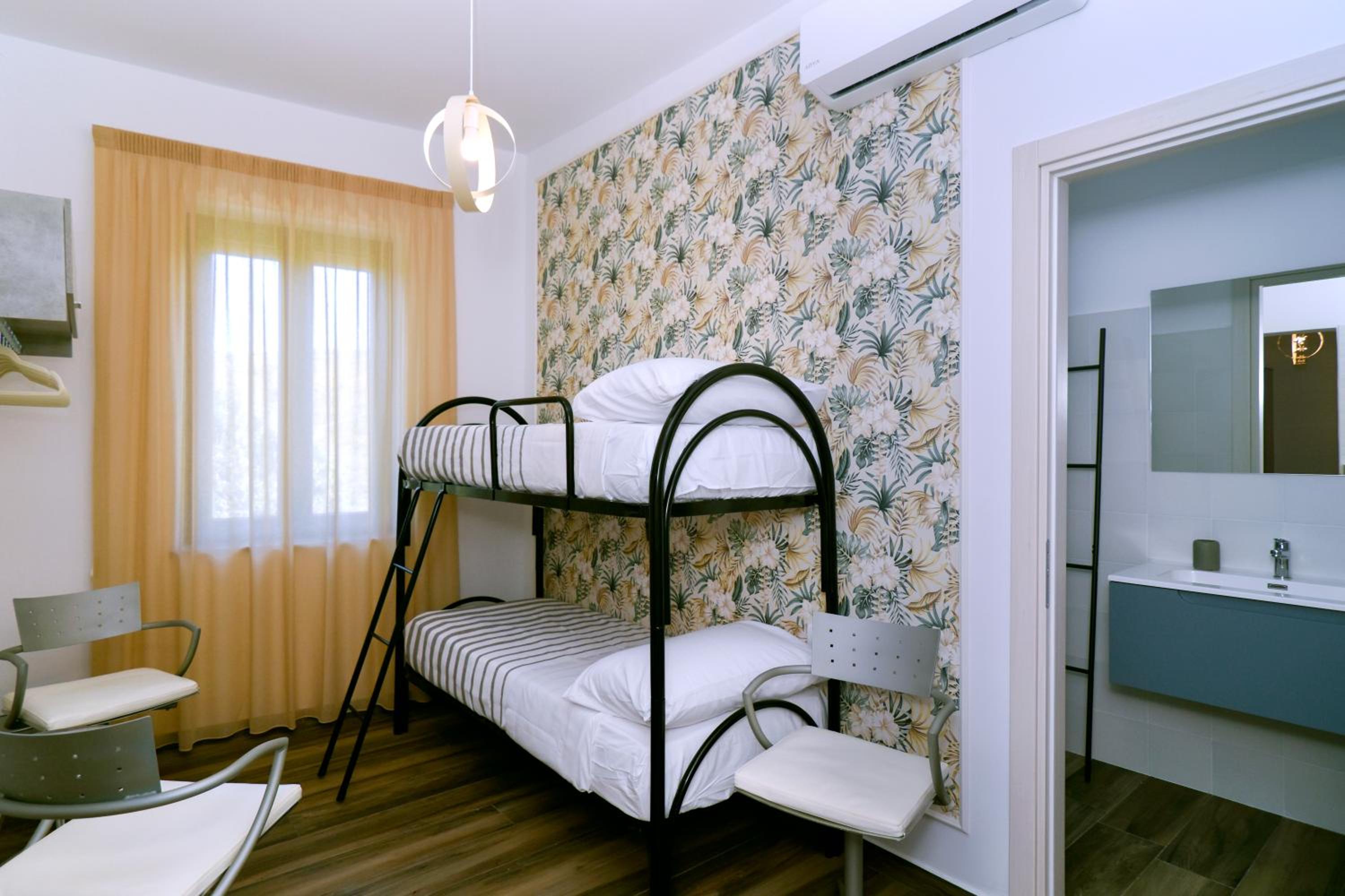 Quadruple Room with Balcony photo 1