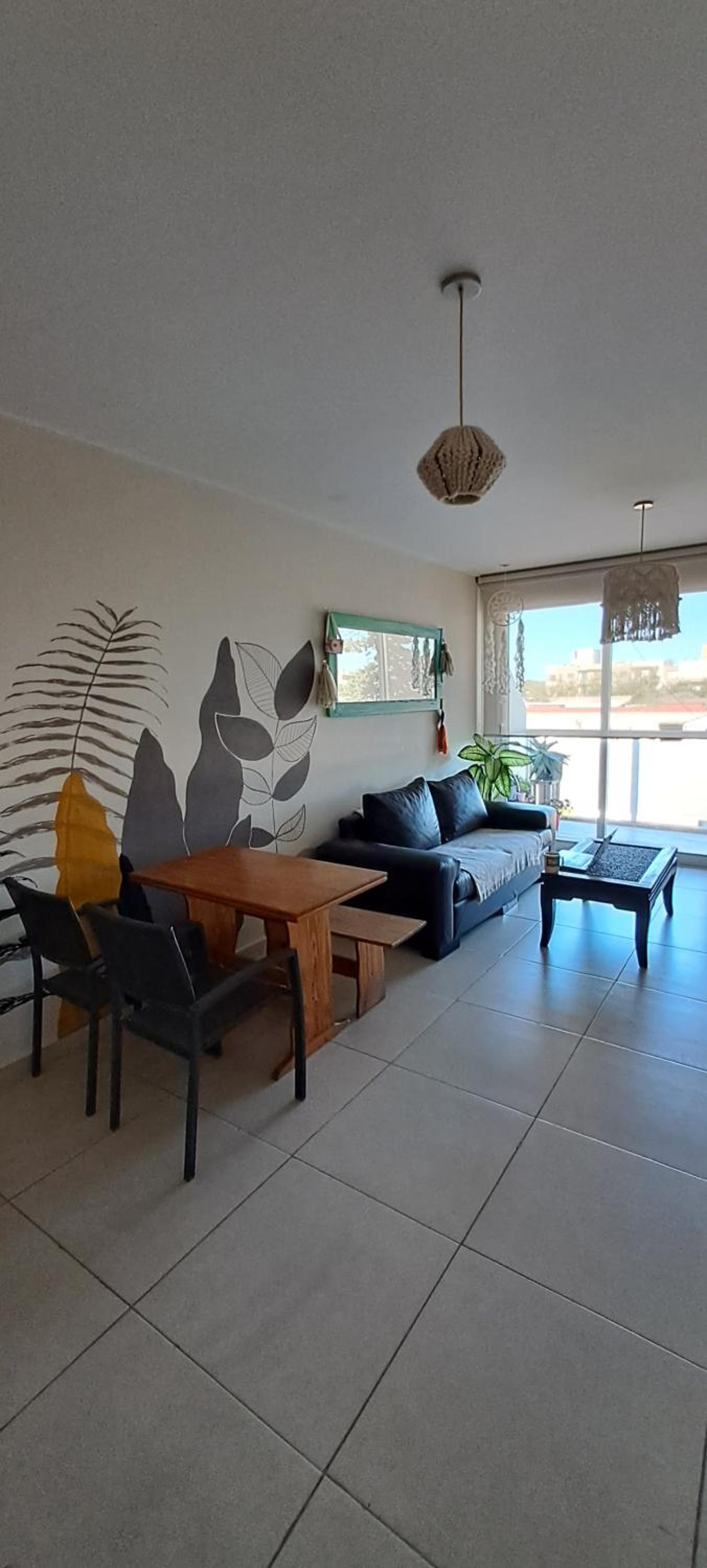 One-Bedroom Apartment with Balcony and City View photo 1