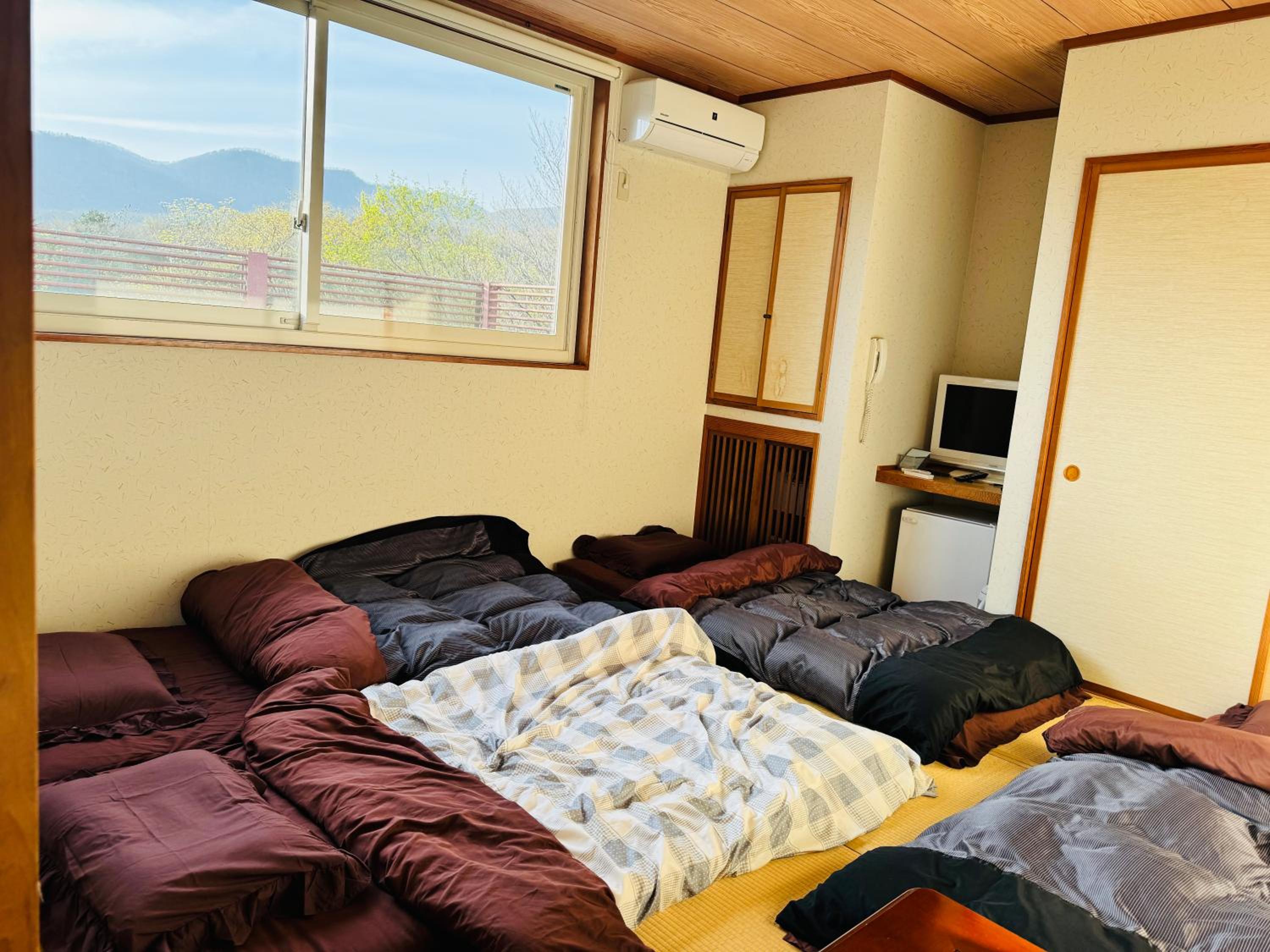 Japanese-Style Quadruple Room photo 3