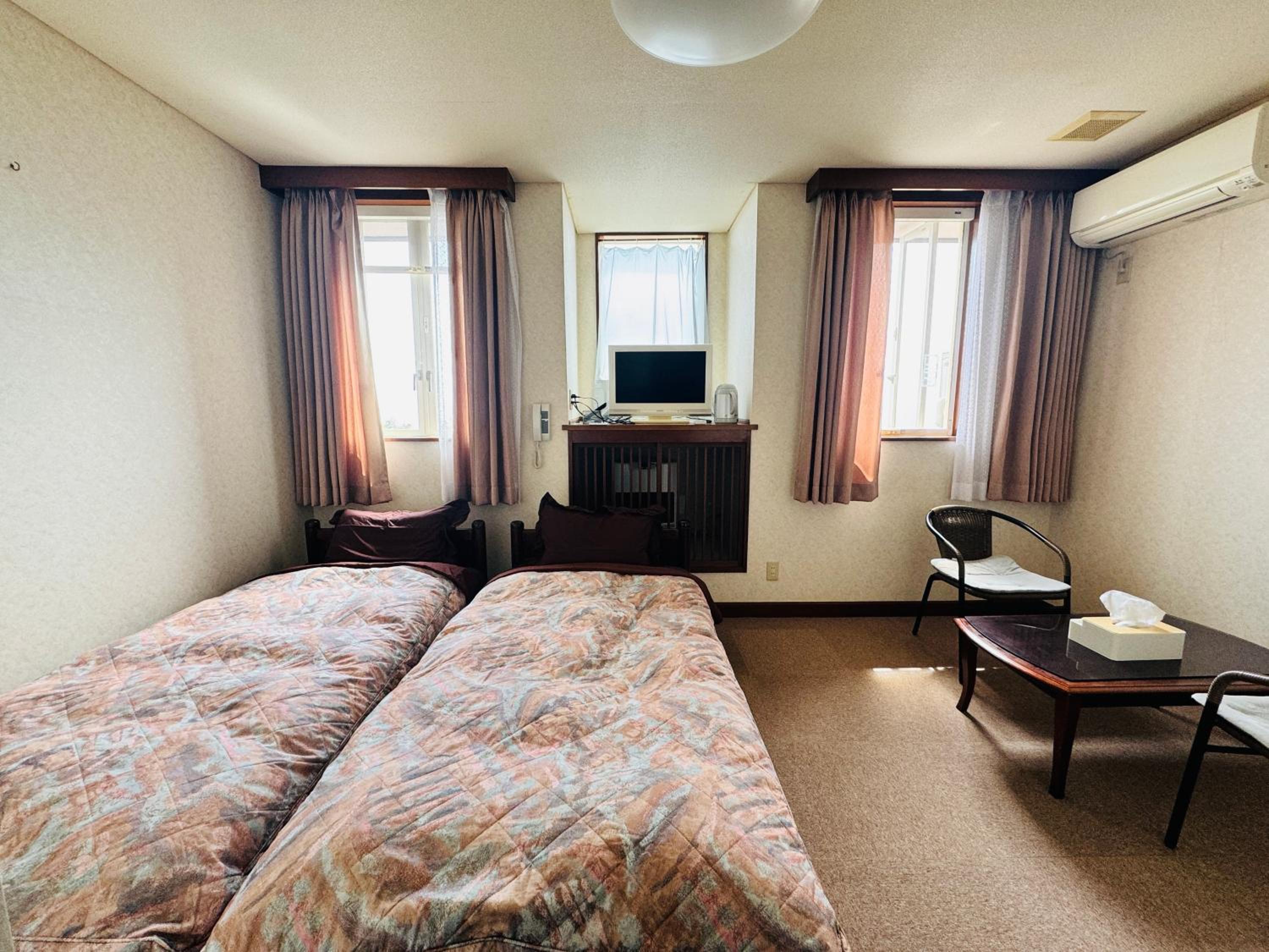 Twin Room with Mountain View photo 1