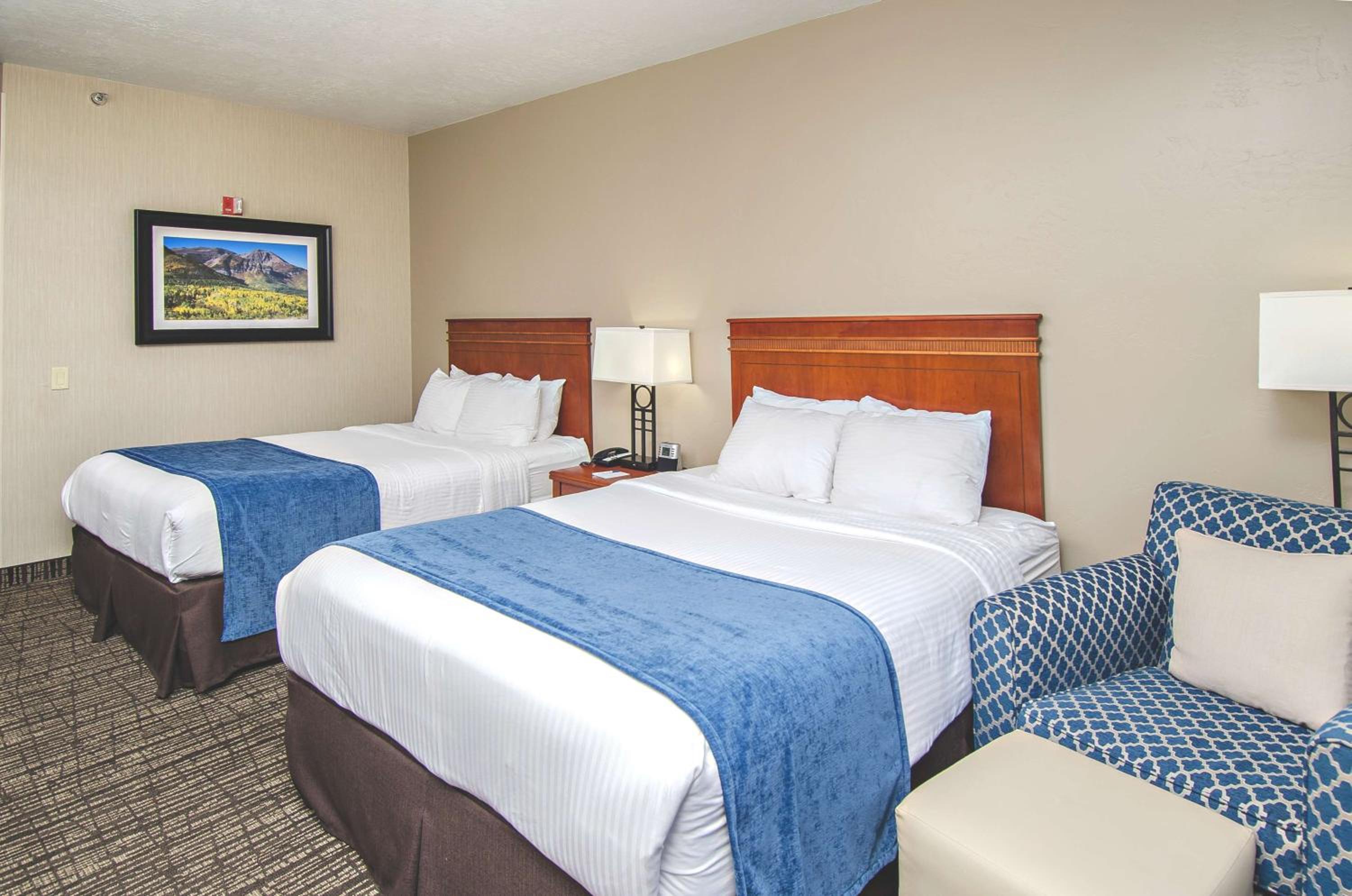Deluxe Queen Room with Two Queen Beds - Photo 1