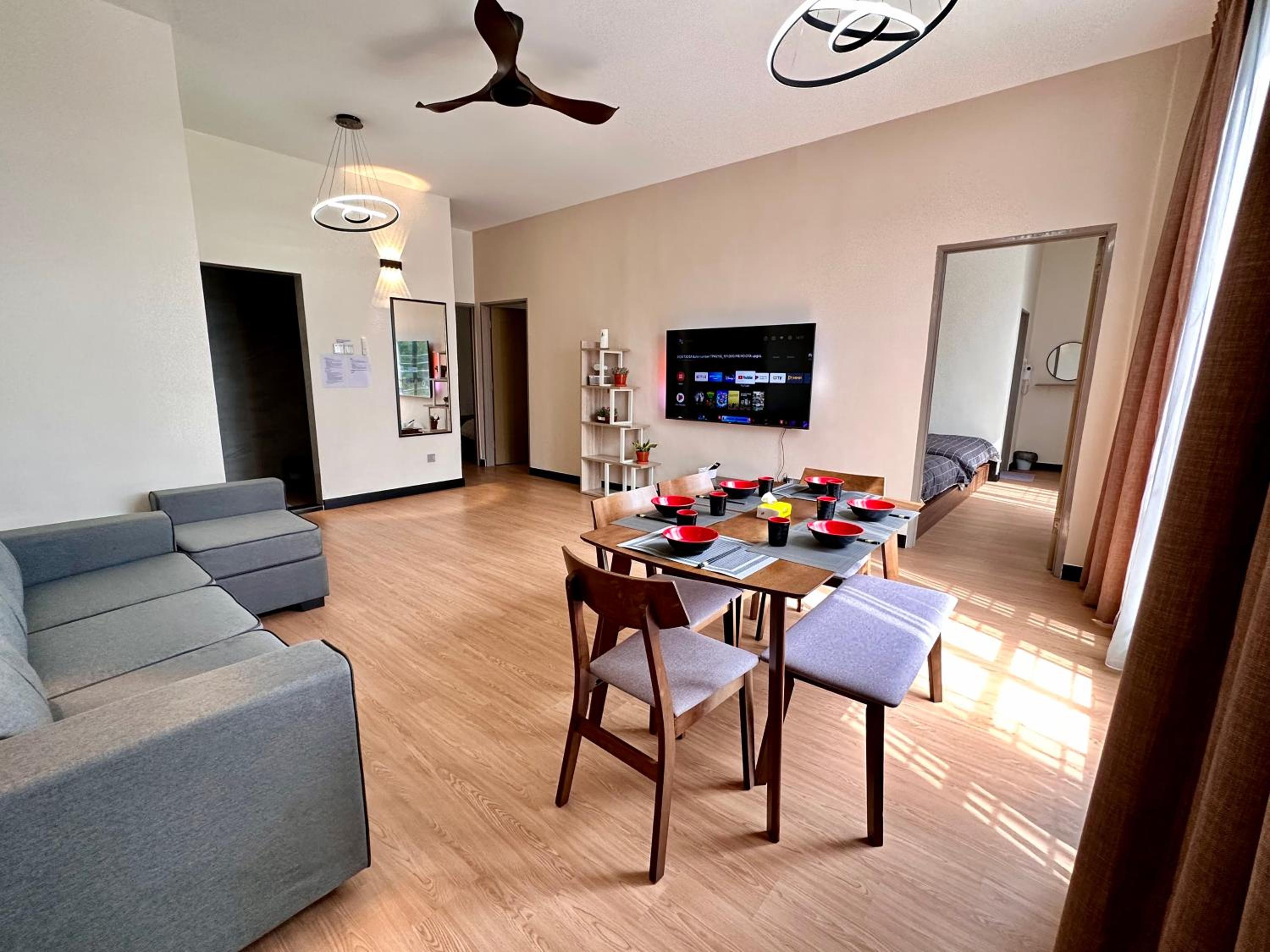 Three-Bedroom Apartment photo 1
