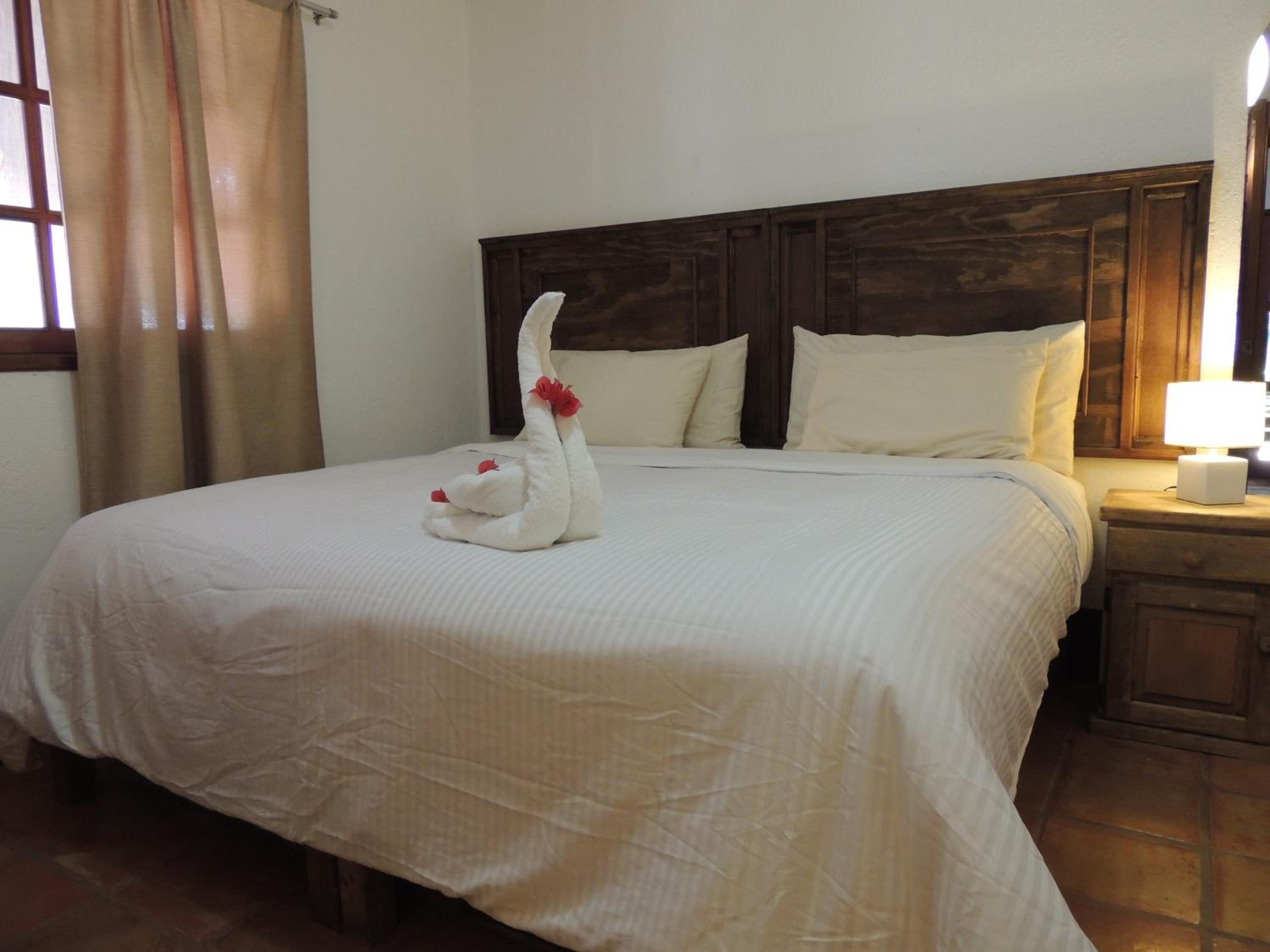 Economy Quadruple Room - Photo 9