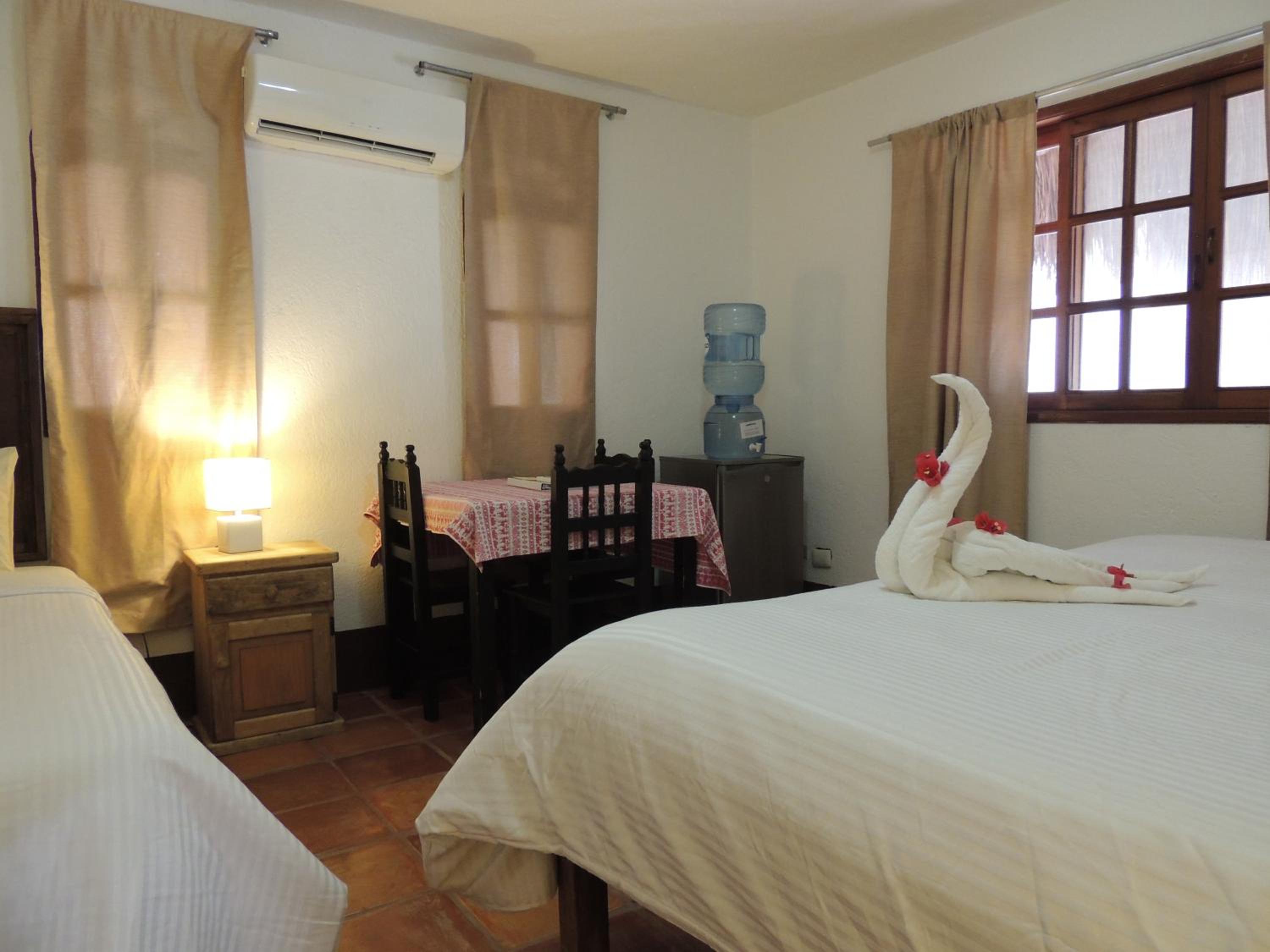 Economy Quadruple Room - Photo 10
